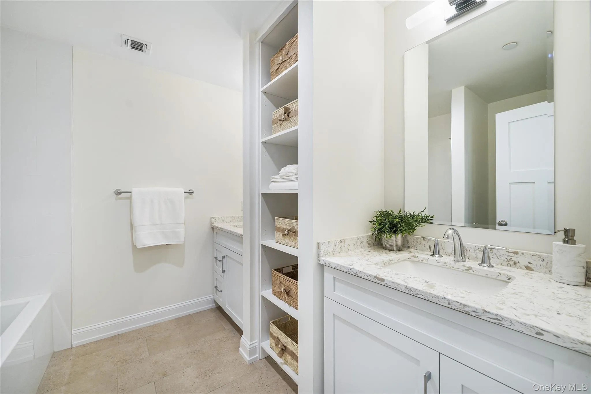 Bathroom featuring vanity Bathroom featuring vanity