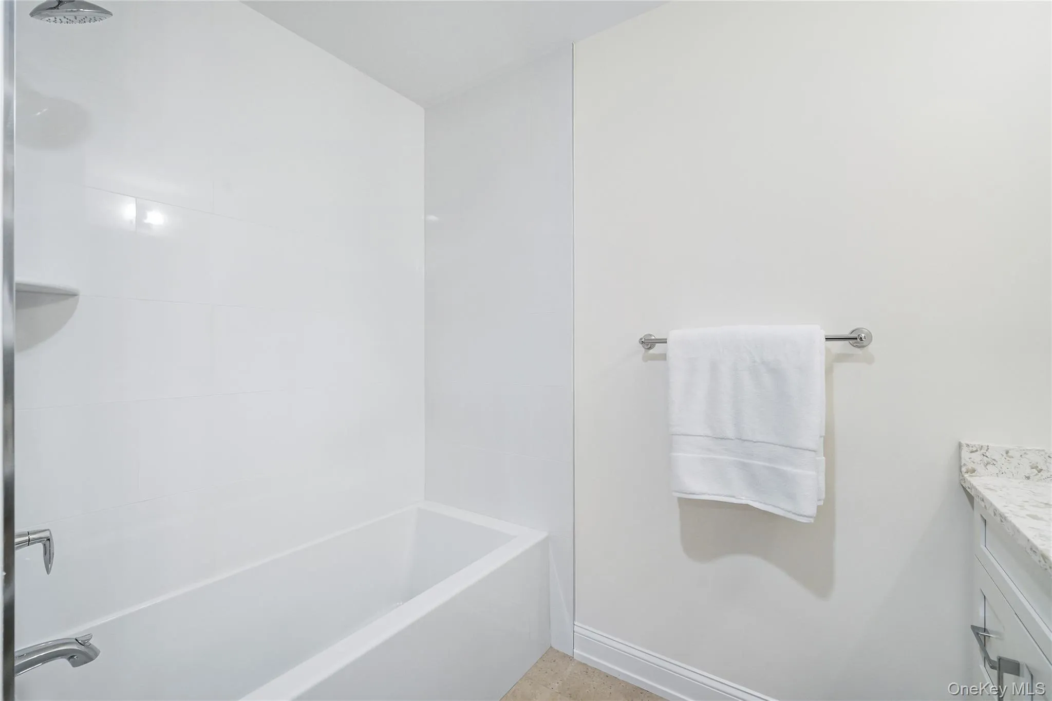 Bathroom with vanity and shower / bathing tub combination Bathroom with vanity and shower / bathing tub combination