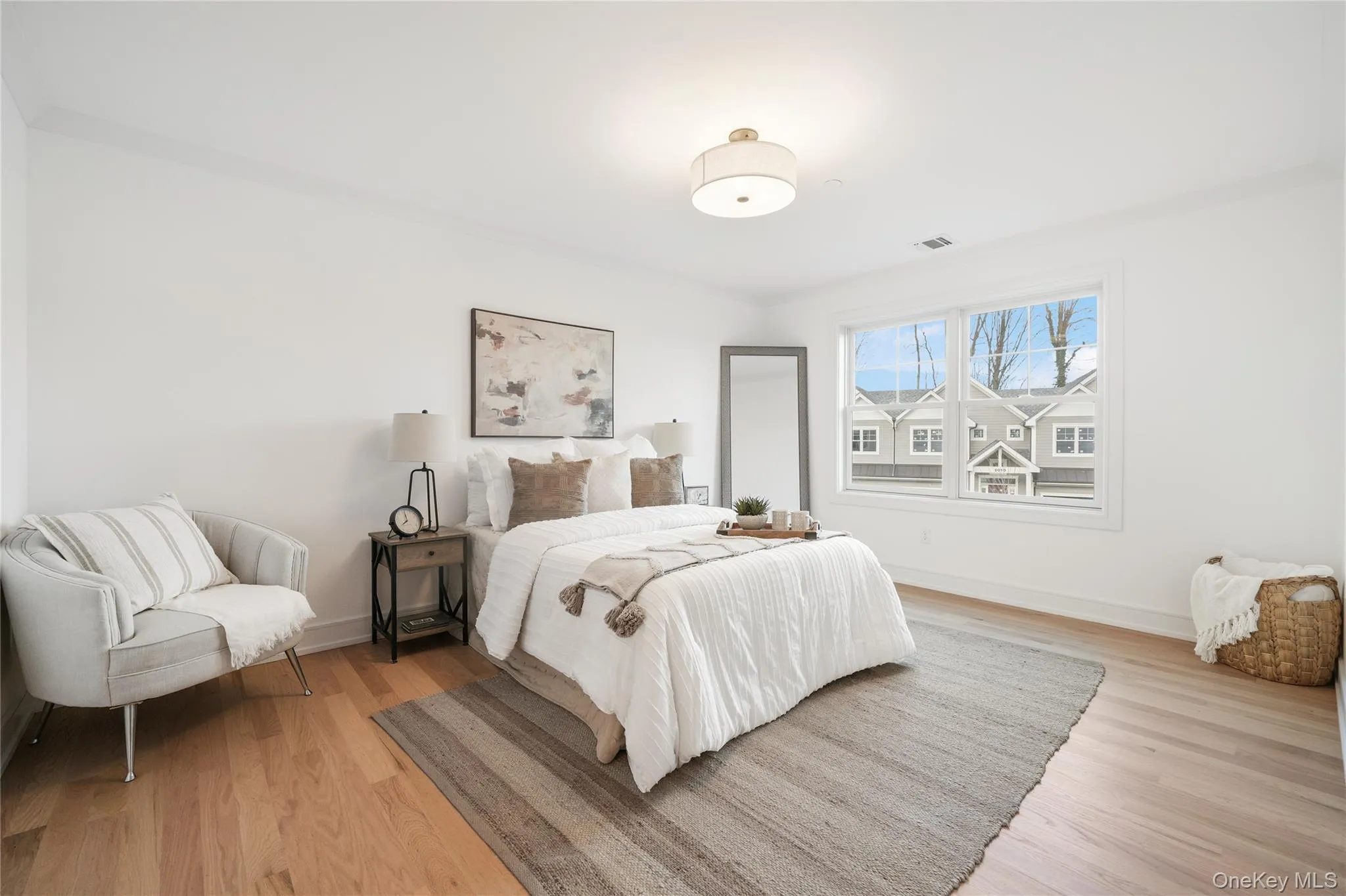 Bedroom featuring light hardwood / wood-style floors Bedroom featuring light hardwood / wood-style floors