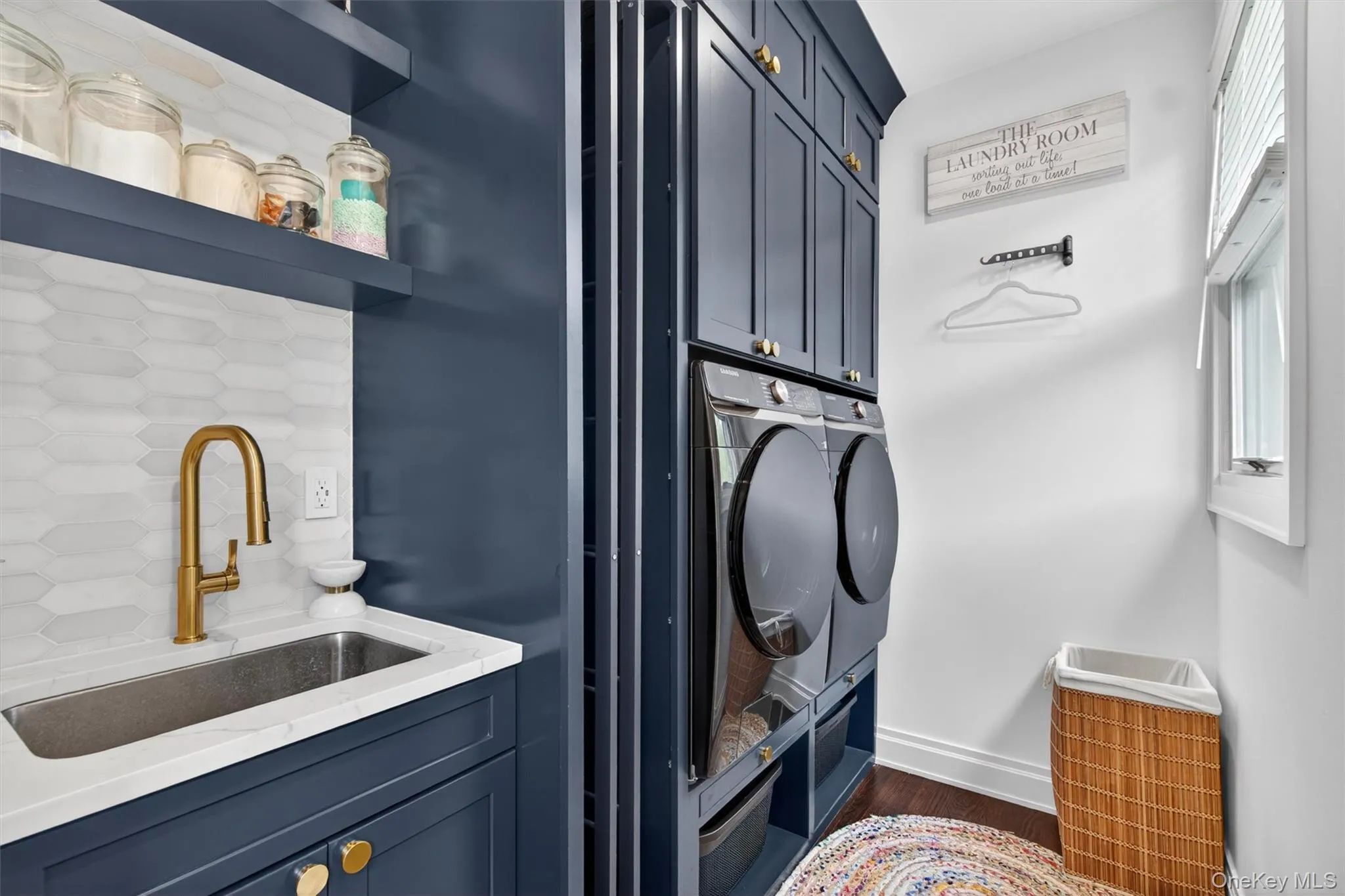 Laundry room, 4th sink, custom cabinetry Laundry room, 4th sink, custom cabinetry