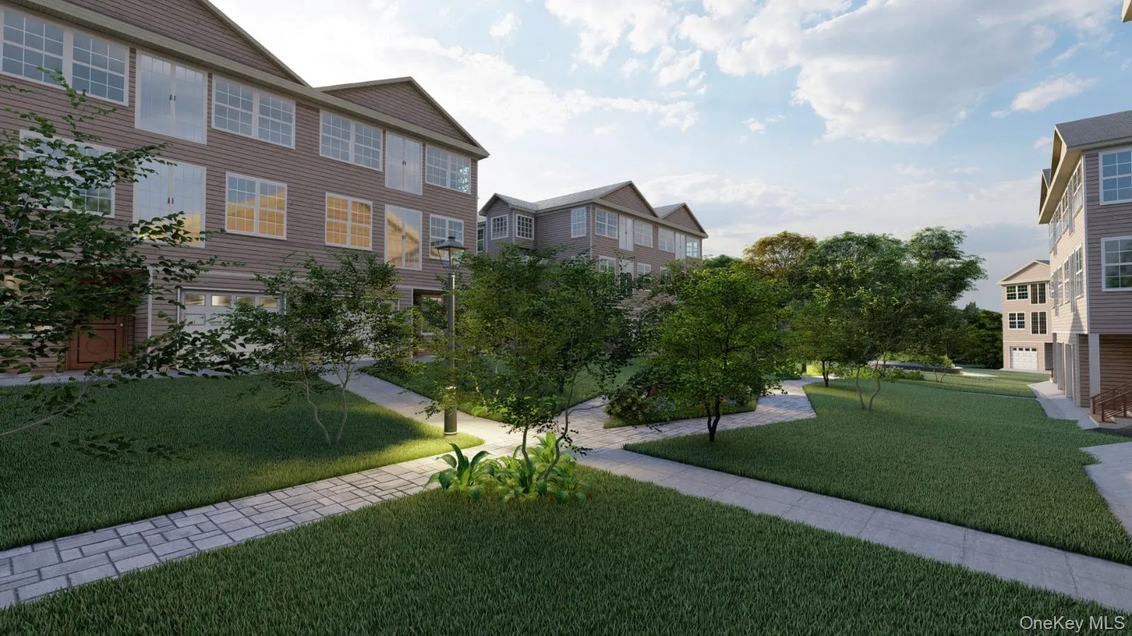Community green space featuring paver walkways, manicured lawns, and mature landscaping Community green space featuring paver walkways, manicured lawns, and mature landscaping