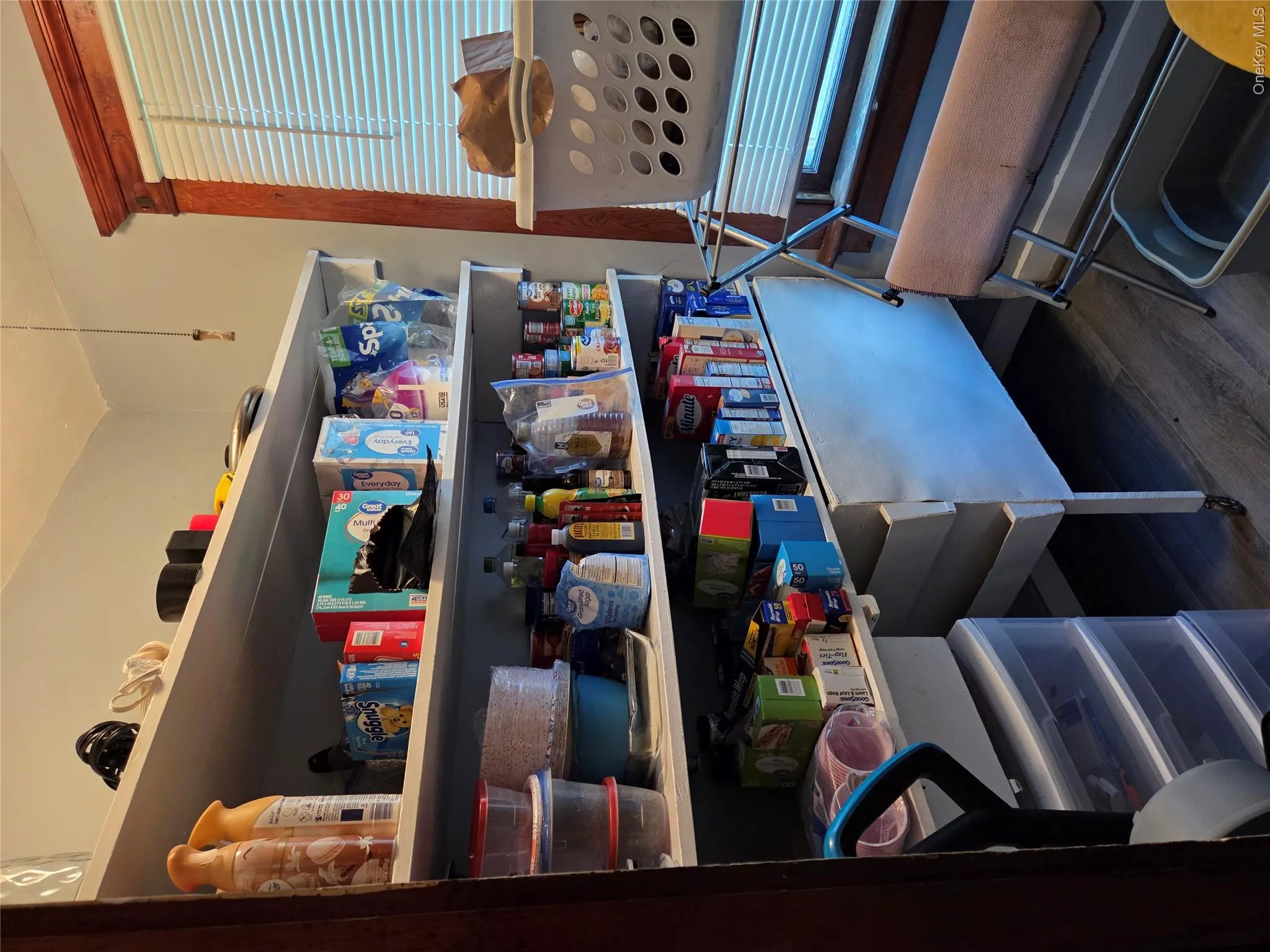Located off the Kitchen area also leading down to the basement. Located off the Kitchen area also leading down to the basement.
