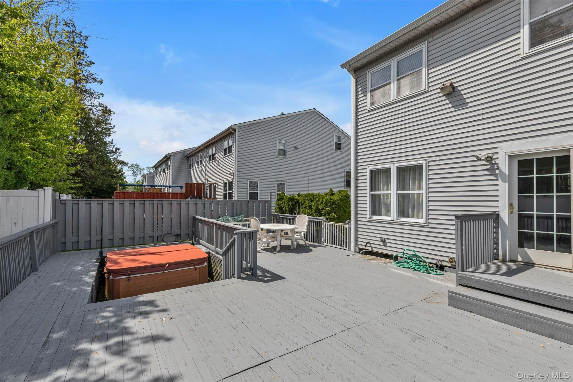 Large deck with access to private yard. Great for entertaining! Large deck with access to private yard. Great for entertaining!