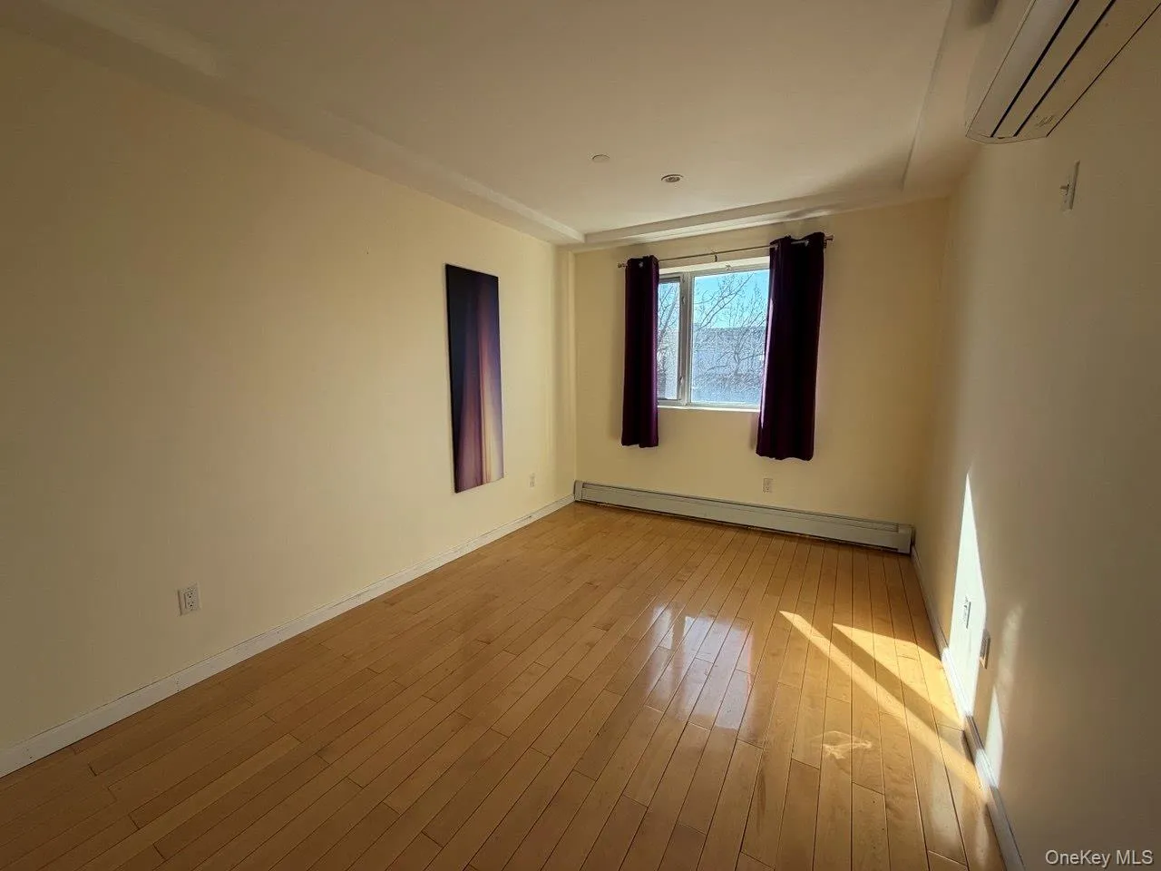Hardwood flooring complemented by crown molding and baseboards Hardwood flooring complemented by crown molding and baseboards
