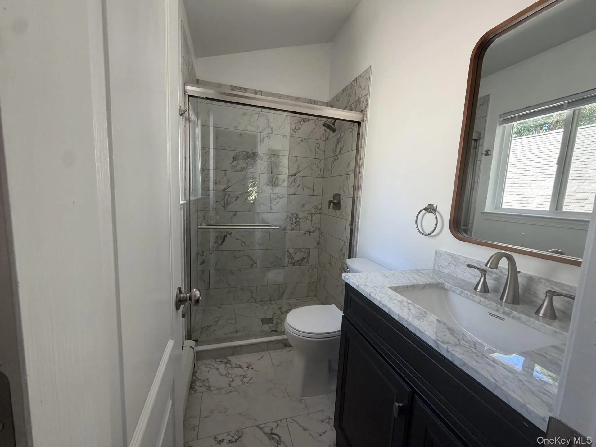 Newly renovated primary bath Newly renovated primary bath