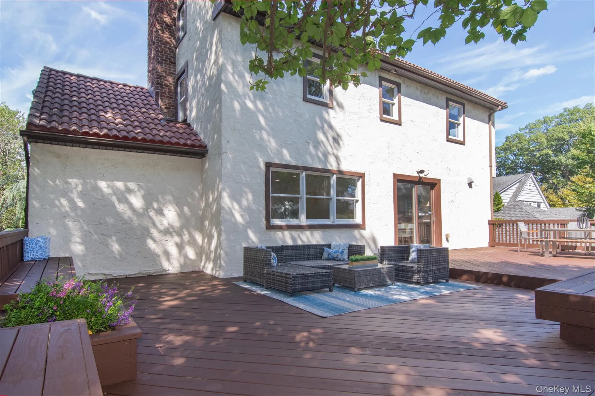 Wooden deck with outdoor lounge area Wooden deck with outdoor lounge area