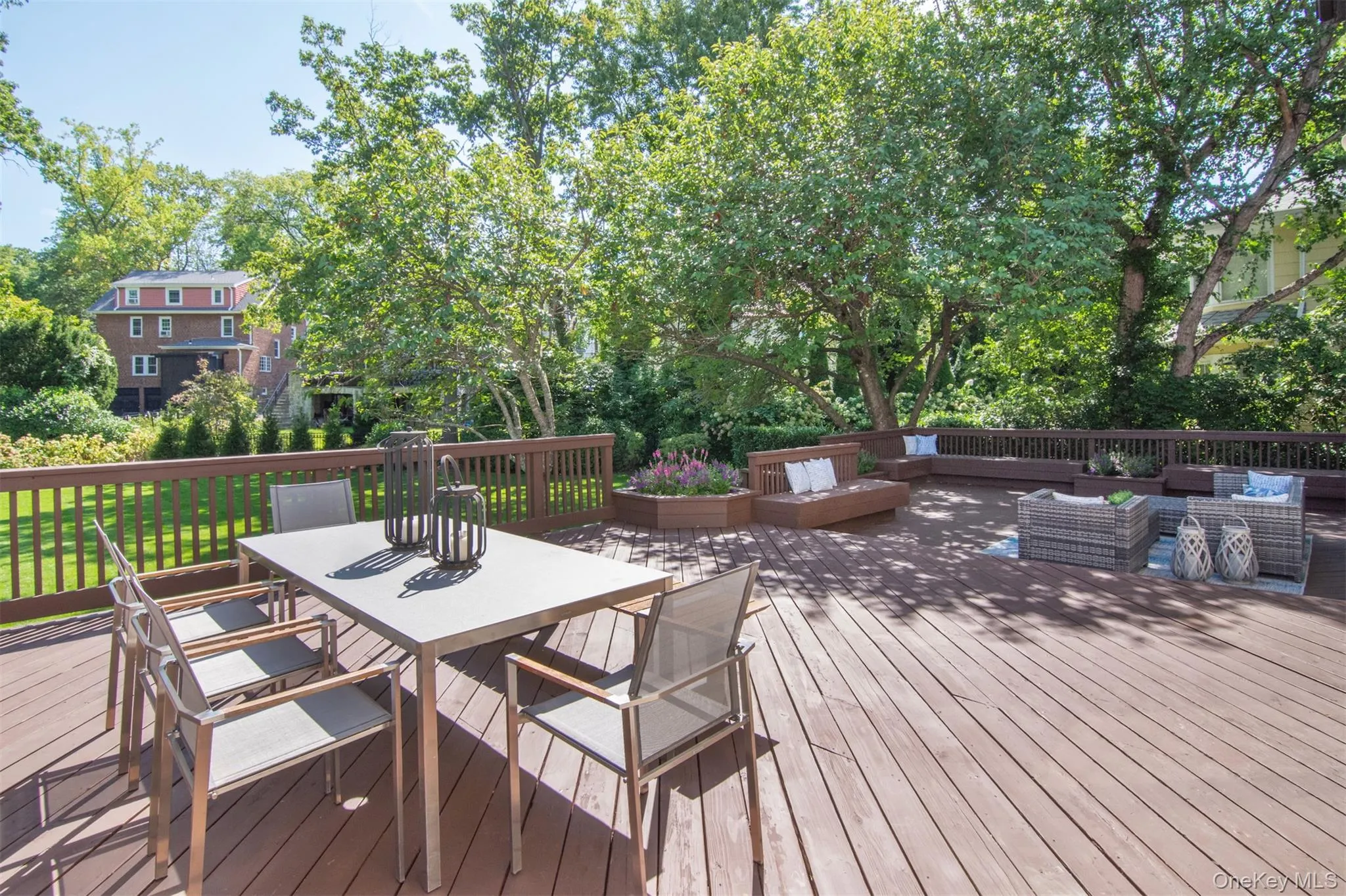 Deck featuring outdoor dining space and an outdoor living space Deck featuring outdoor dining space and an outdoor living space