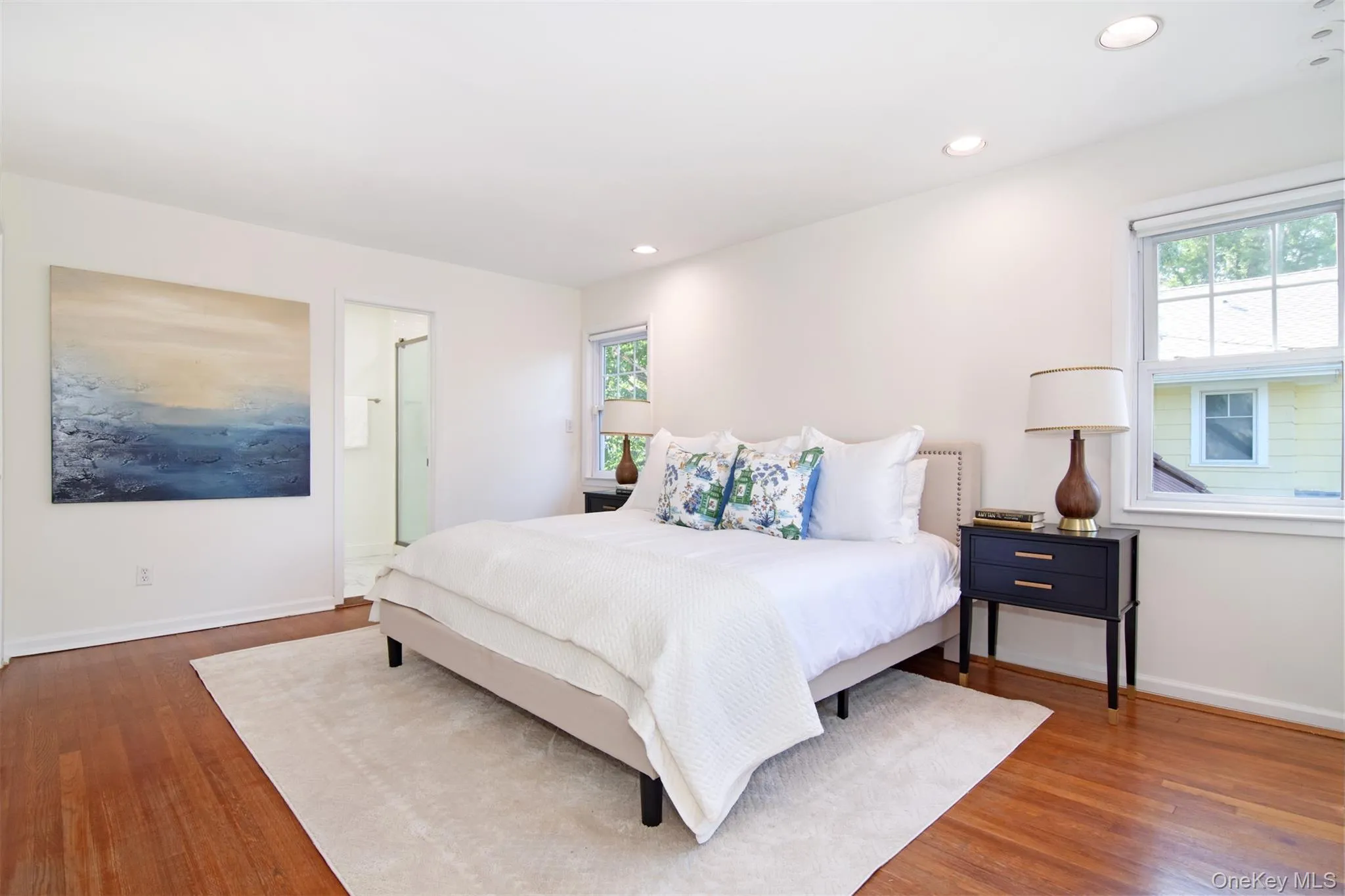 Bedroom with recessed lighting and wood finished floors Bedroom with recessed lighting and wood finished floors