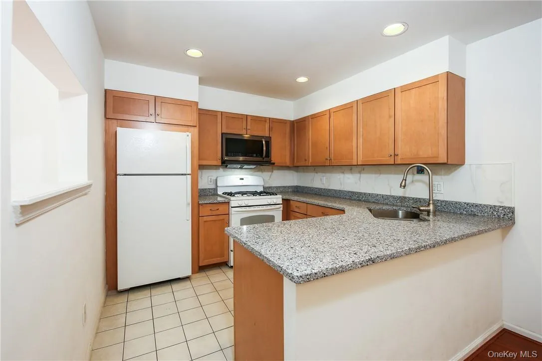 Kitchen with granite countertop Kitchen with granite countertop