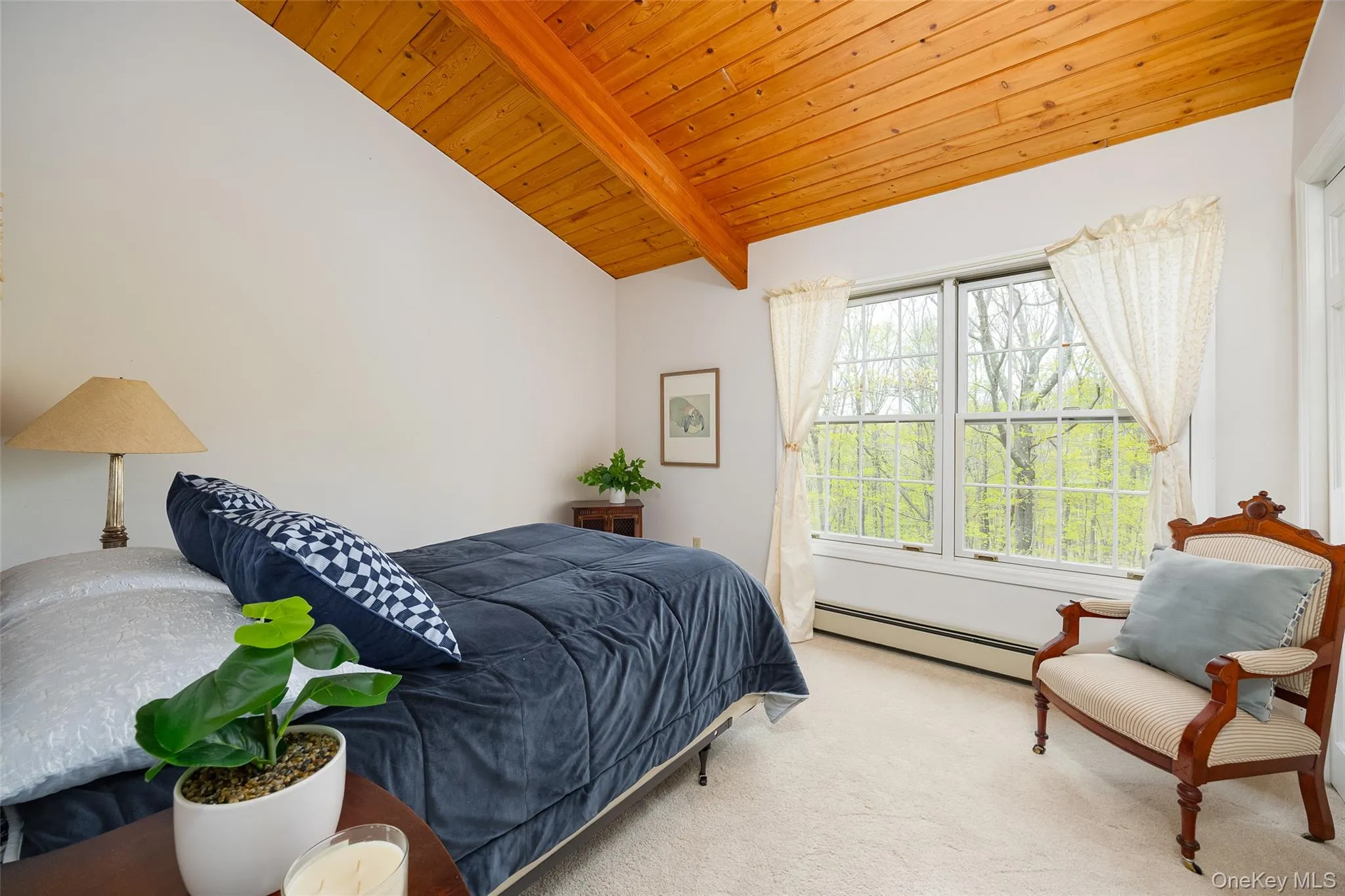 Guest Bedroom Featuring Rustic Wood Panel Ceilings and Great Light.... Guest Bedroom Featuring Rustic Wood Panel Ceilings and Great Light....