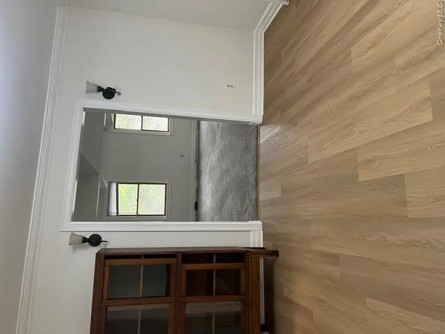 Leads to Large living Rm with new carpet, high ceiling and 5 windows Leads to Large living Rm with new carpet, high ceiling and 5 windows