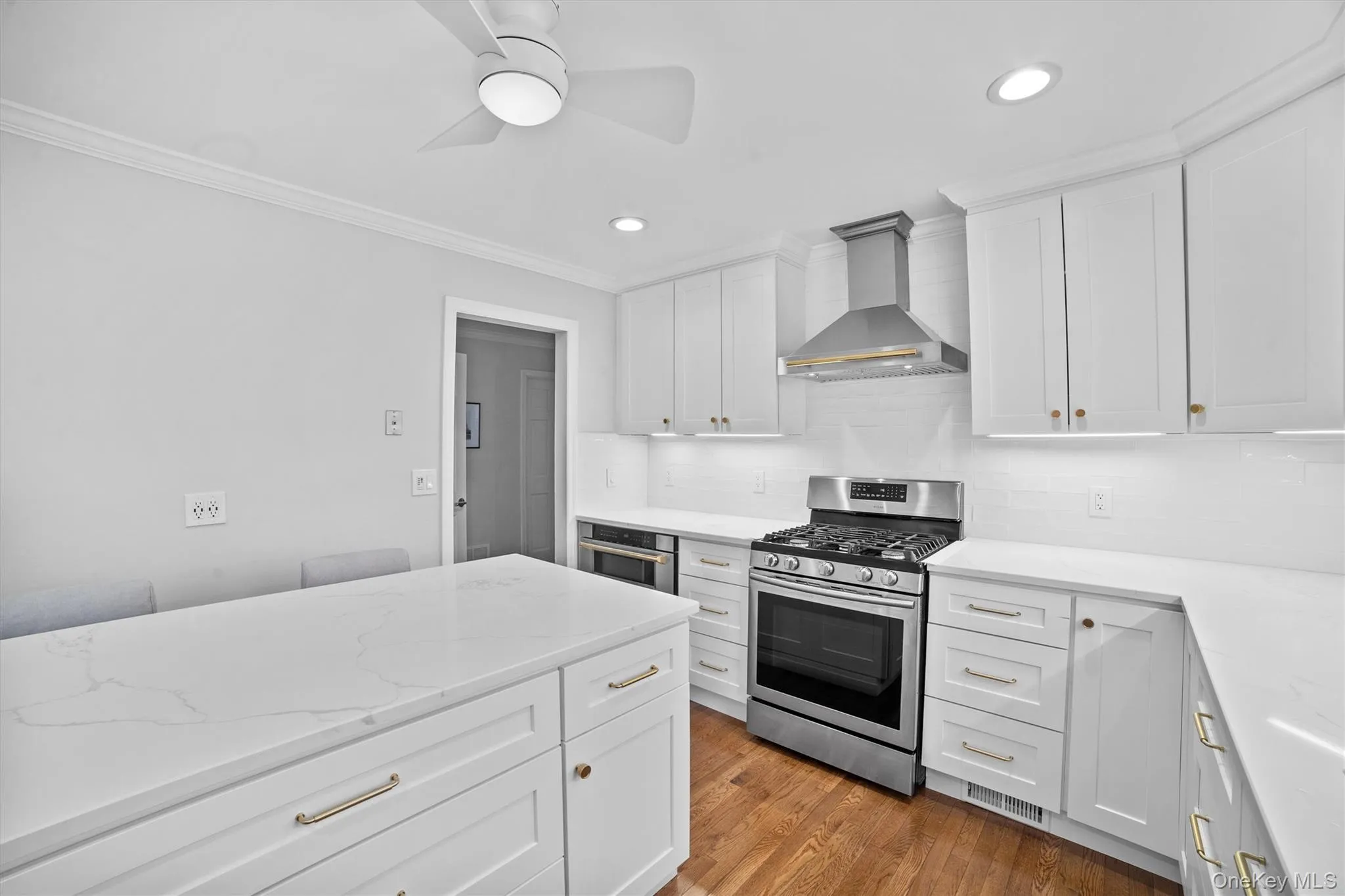 All new cabinetry, hardwood floors, range hood All new cabinetry, hardwood floors, range hood