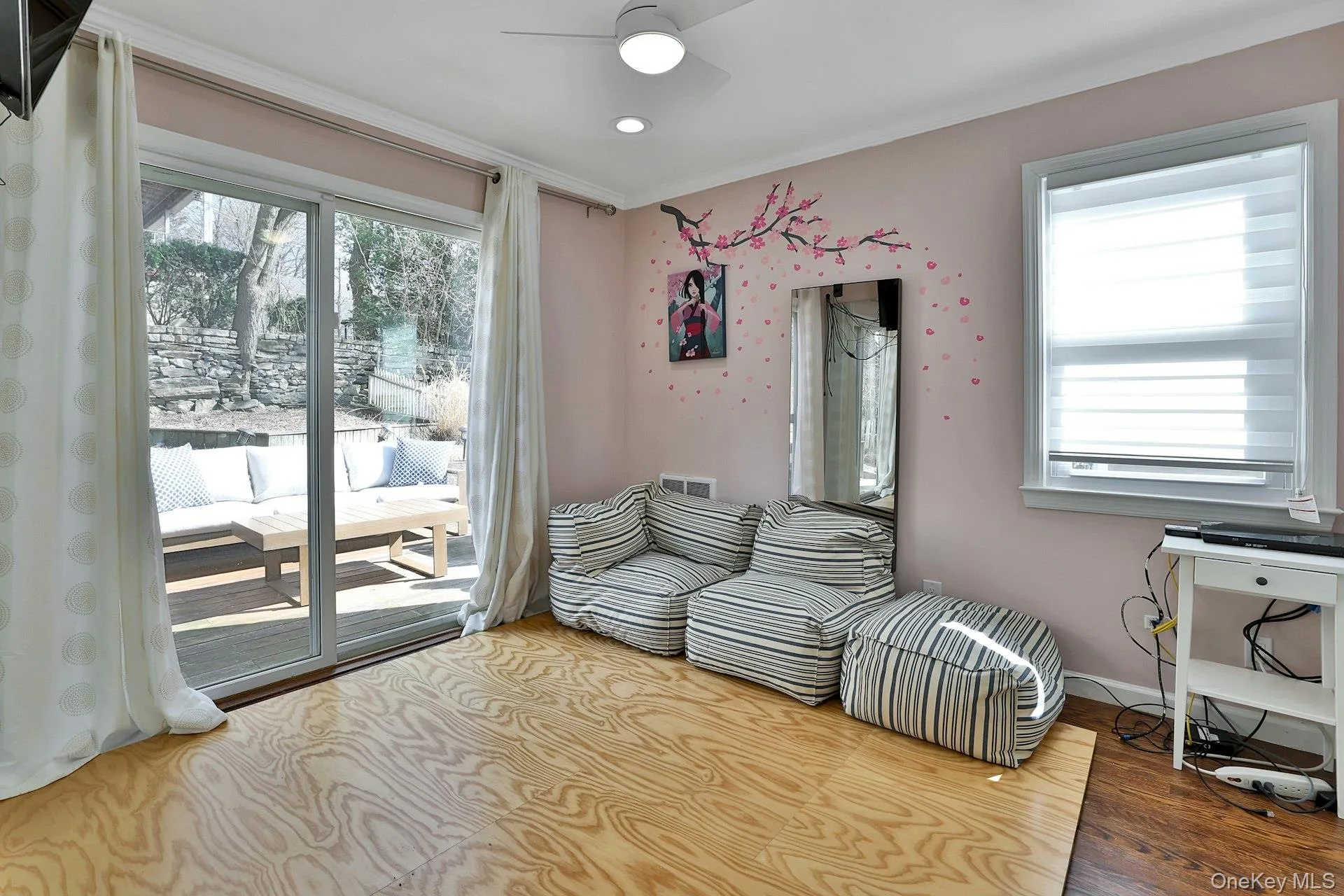 1st floor bedroom with sliding glass doors to deck 1st floor bedroom with sliding glass doors to deck