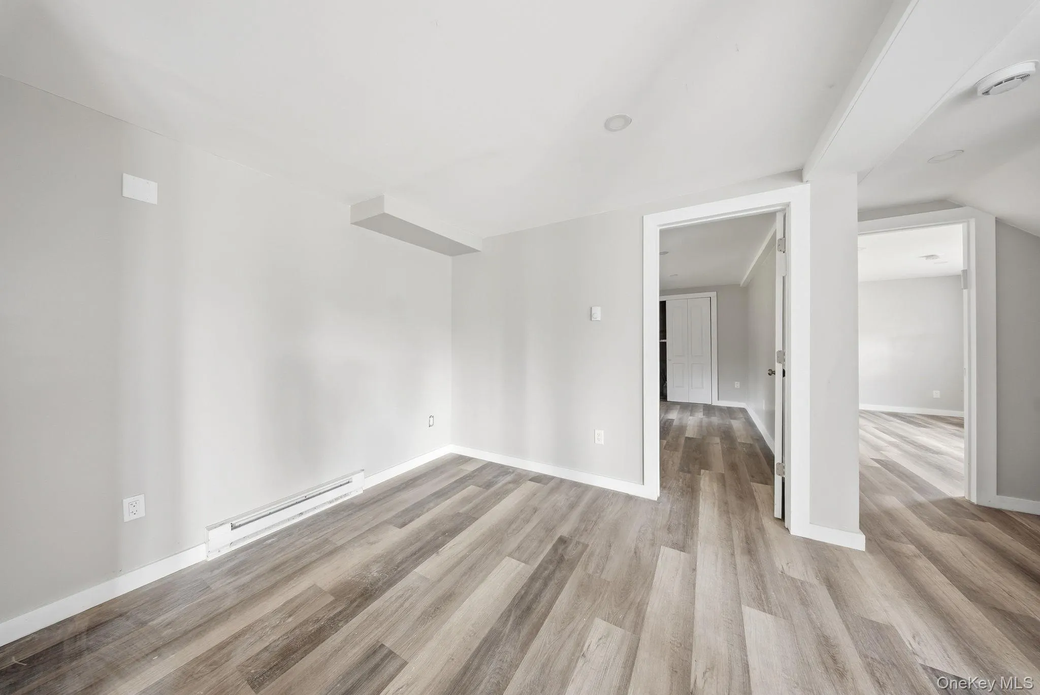 View of 2 bedrooms from family room, bottom floor. View of 2 bedrooms from family room, bottom floor.