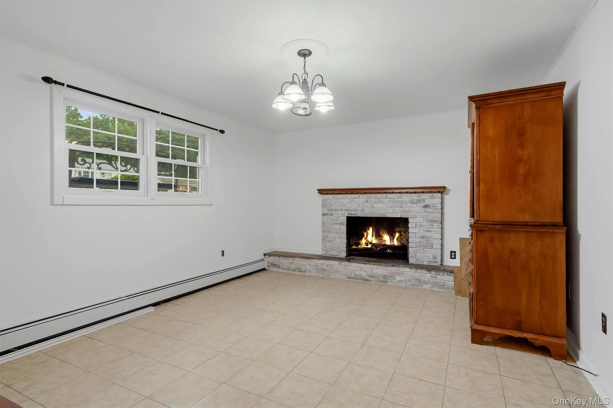 Spacious family room with fireplace. Spacious family room with fireplace.