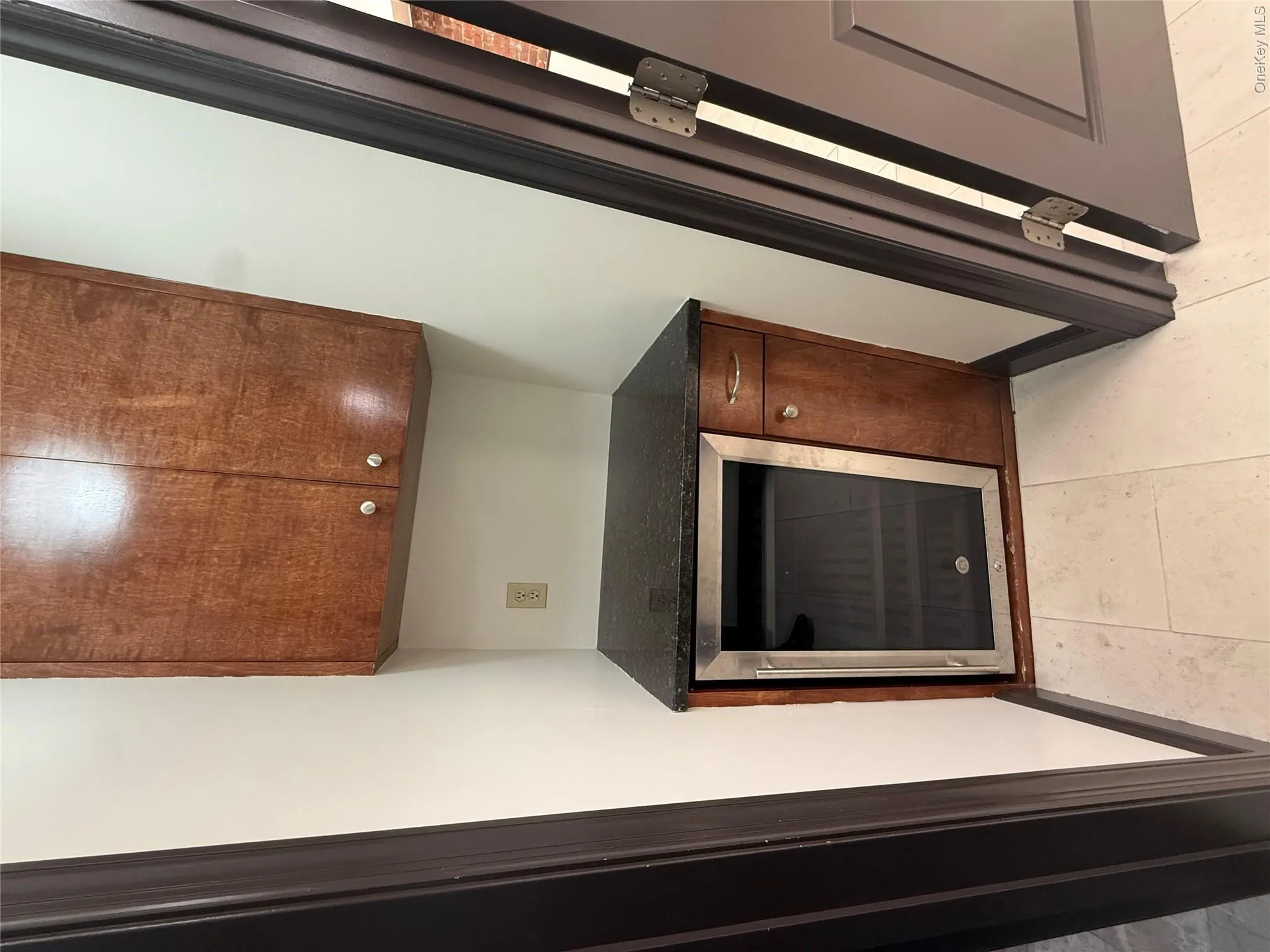 Small nook before bathroom for storage w/ under counter refrigerator Small nook before bathroom for storage w/ under counter refrigerator