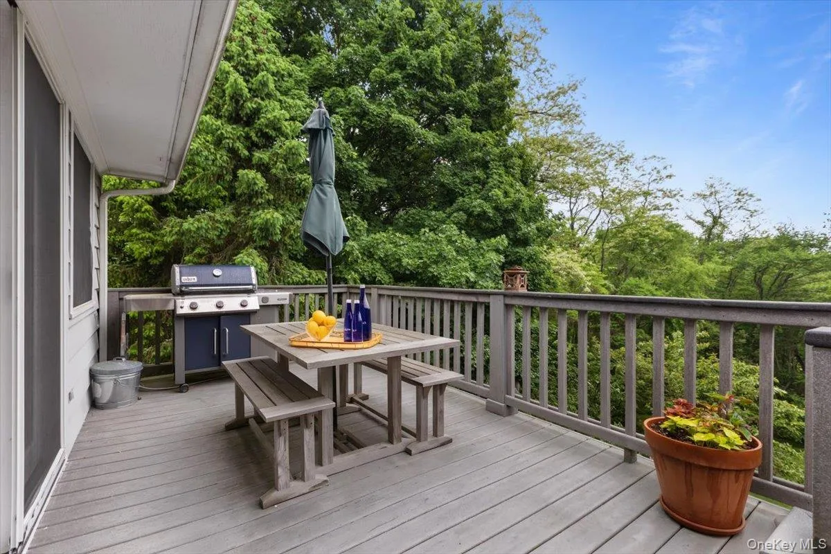 The large Trex deck off the Family Room (connected to the Dining Room deck) offers views of the backyard and golf course. The large Trex deck off the Family Room (connected to the Dining Room deck) offers views of the backyard and golf course.
