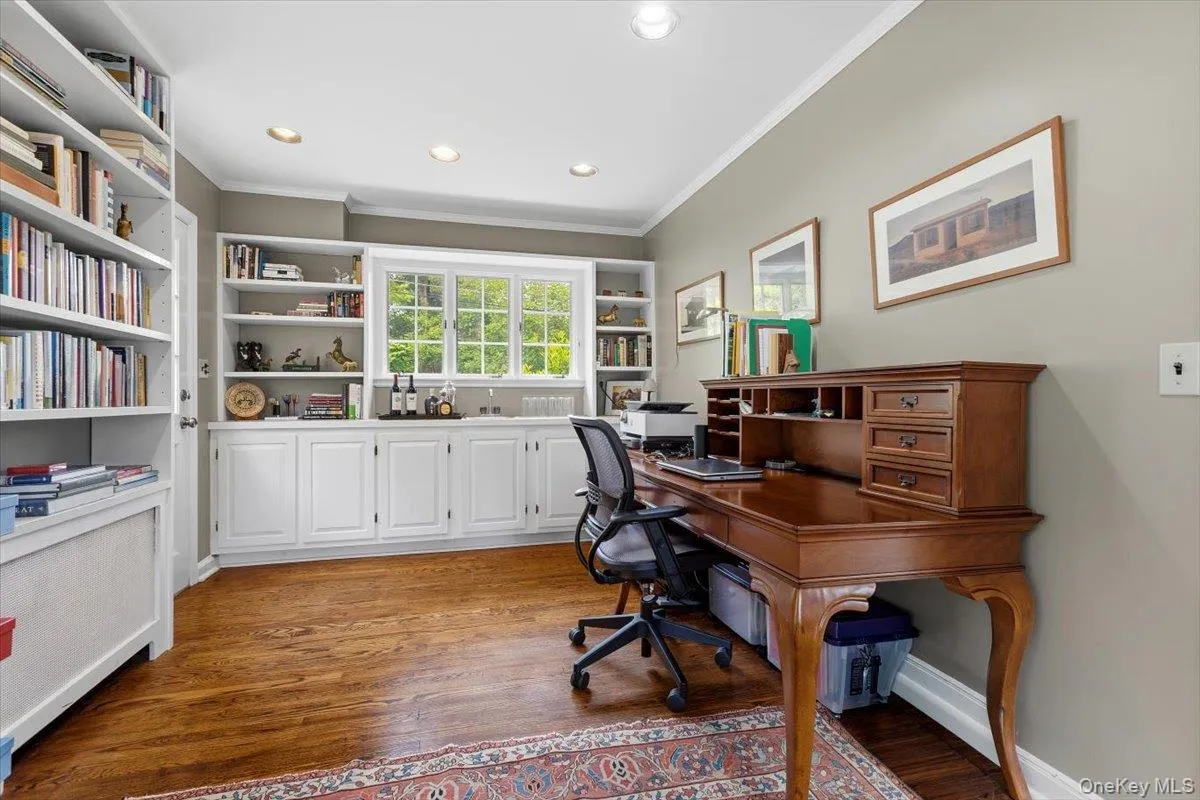 A close up of the main floor Office area combined with a sitting area/Den. A close up of the main floor Office area combined with a sitting area/Den.