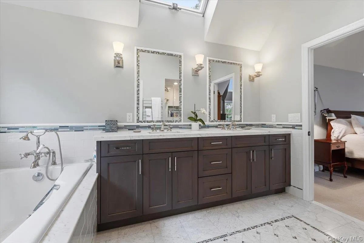The Primary Bathroom double sink vanity & double medicine chest. The Primary Bathroom double sink vanity & double medicine chest.