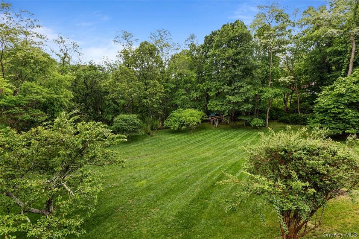 The 1.5+ acres is large enough to provide ample play and entertaining areas, and is also surrounded by mature trees for privacy. The 1.5+ acres is large enough to provide ample play and entertaining areas, and is also surrounded by mature trees for privacy.