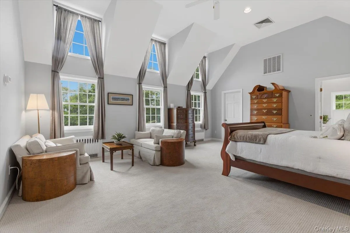 The Primary Suite boasts a separate sitting area, updated windows in 2016, and new AC in 2026. The Primary Suite boasts a separate sitting area, updated windows in 2016, and new AC in 2026.