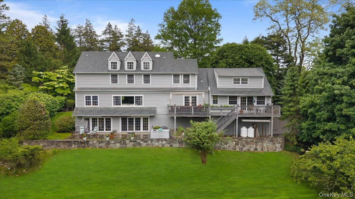 From the rear view of this special home you can appreciate the over 3100+ SF of livable space including a walk-out lower level. From the rear view of this special home you can appreciate the over 3100+ SF of livable space including a walk-out lower level.