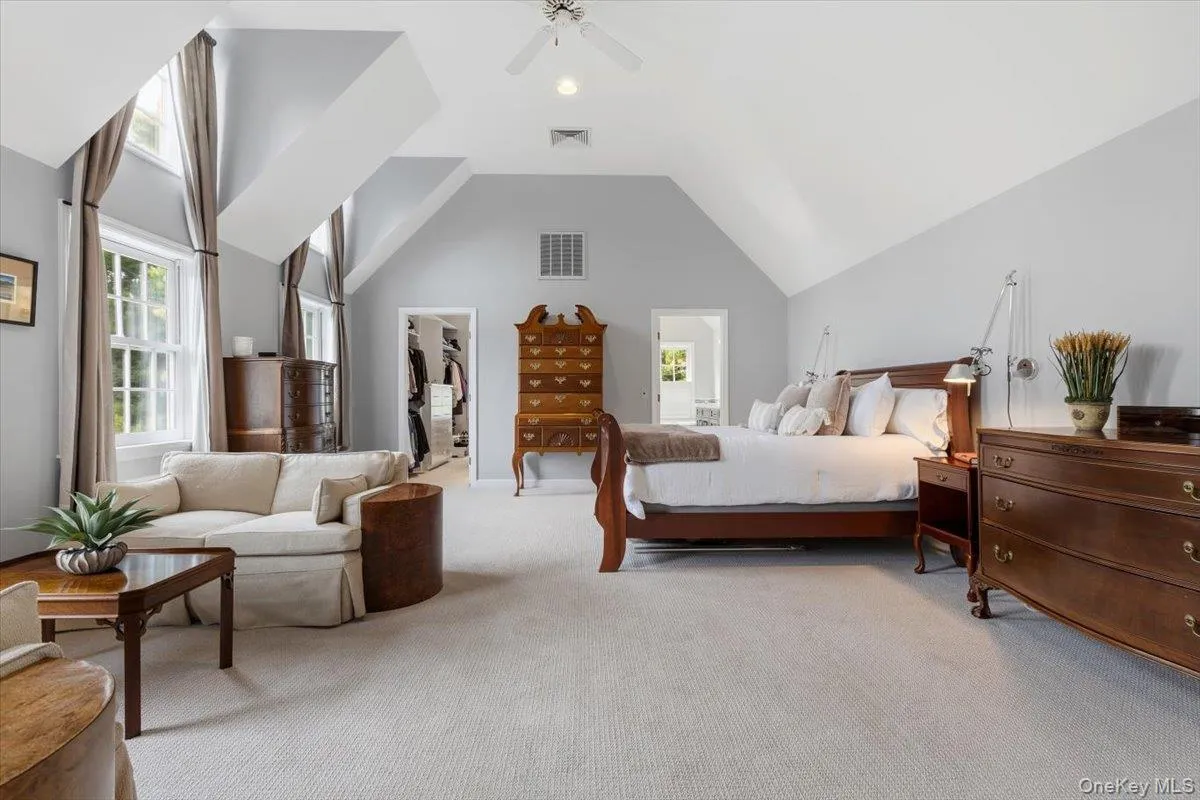 Rivaling anything you've seen, this dramatic Primary Bedroom Suite with high tray ceiling, two custom walk-in closets, recessed lights & ceiling fan will take your breath away. Rivaling anything you've seen, this dramatic Primary Bedroom Suite with high tray ceiling, two custom walk-in closets, recessed lights & ceiling fan will take your breath away.
