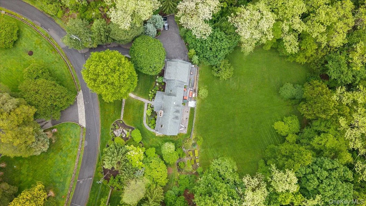 From this view you can delight in the privacy of this home and its expansive yard. From this view you can delight in the privacy of this home and its expansive yard.