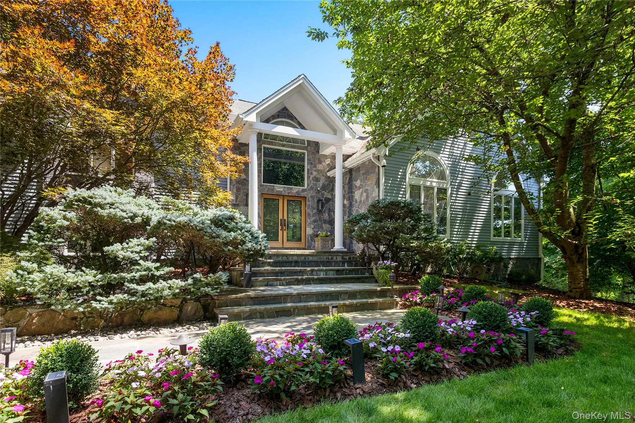 Custom designed and built contemporary colonial with professional landscaping and privacy. Custom designed and built contemporary colonial with professional landscaping and privacy.