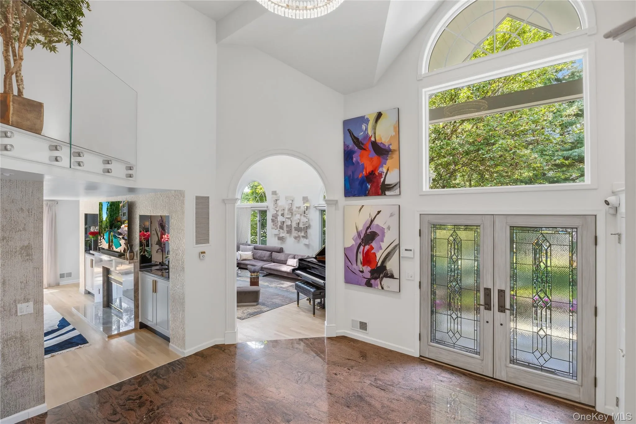 Breathtaking Entry Foyer-perfect for displays of art and filled with natural light Breathtaking Entry Foyer-perfect for displays of art and filled with natural light