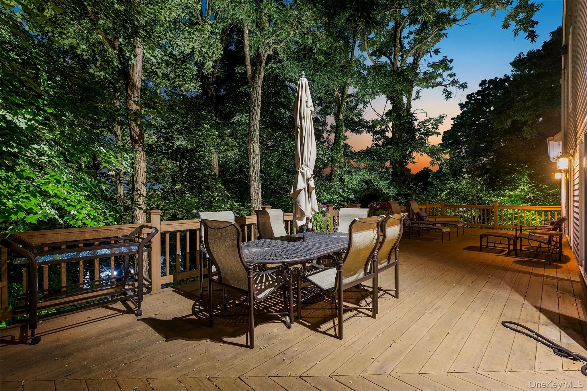 Imagine sunset dinners outside on the expansive wrap-around Deck Imagine sunset dinners outside on the expansive wrap-around Deck