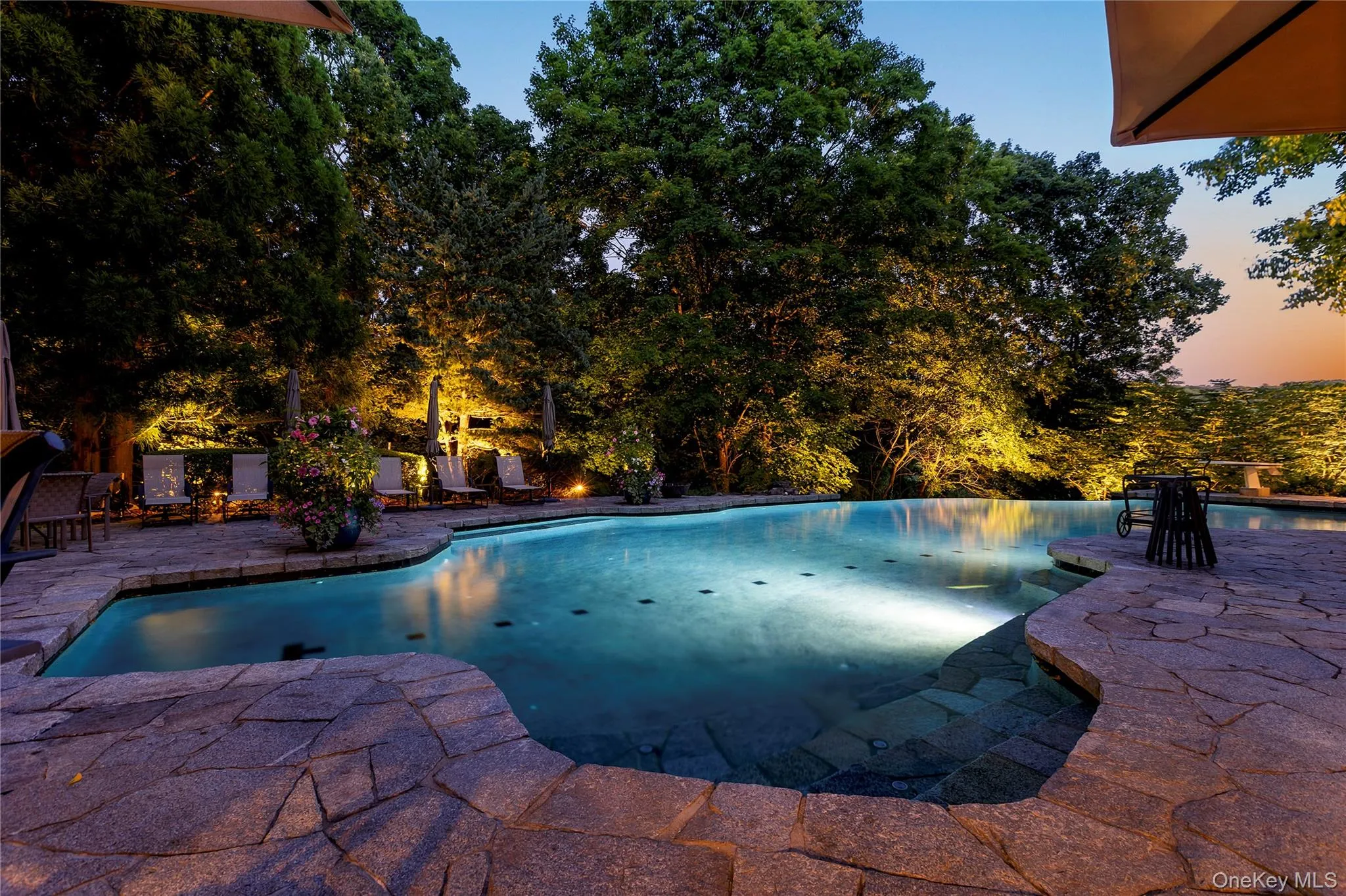 Twilight and sunset views by your very own resort-style pool Twilight and sunset views by your very own resort-style pool