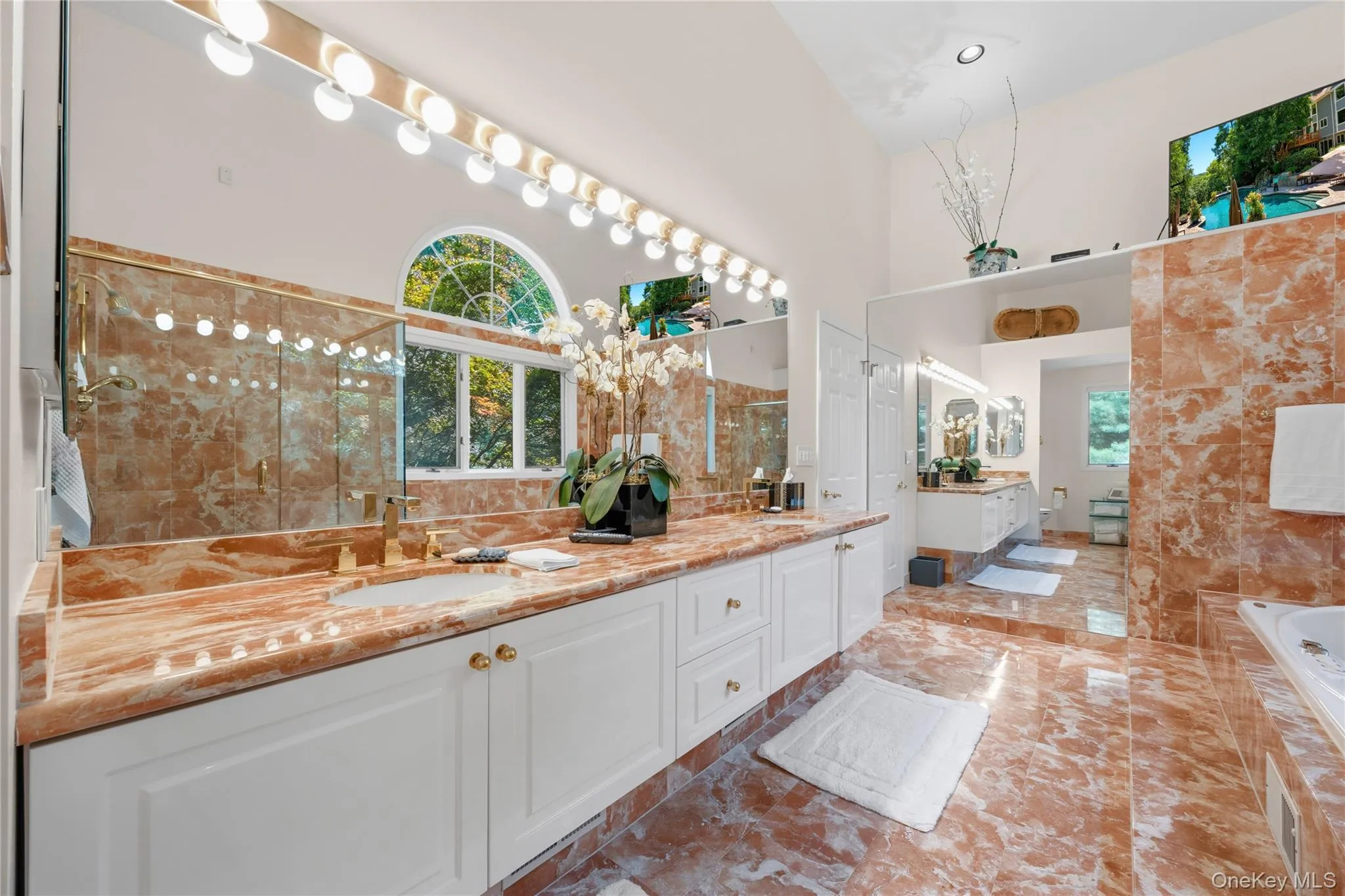 Huge Primary Bathroom with marble double sink vanity Huge Primary Bathroom with marble double sink vanity