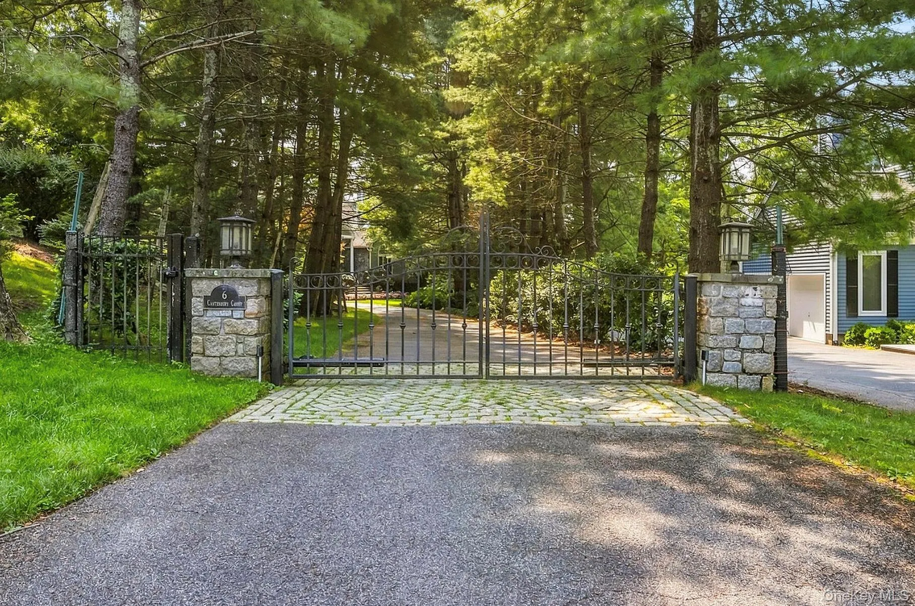 Private Gated Entry with stone pillars Private Gated Entry with stone pillars