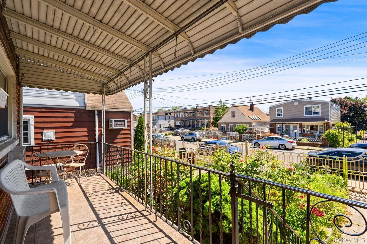 Front patio with covered awning. Front patio with covered awning.