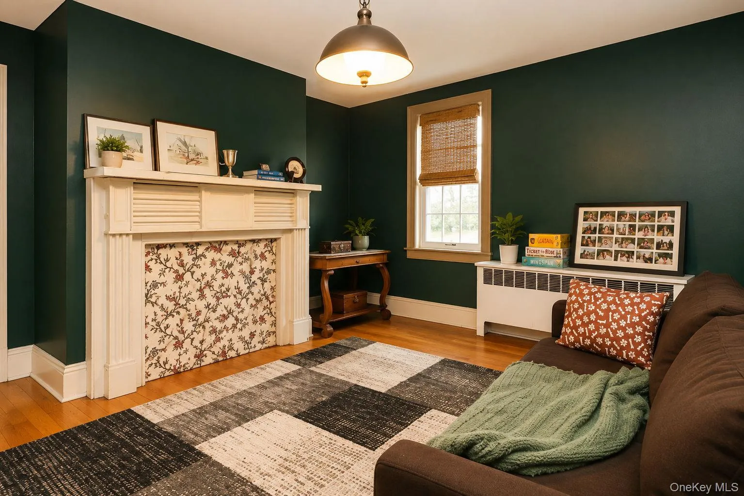 Den with decorative wood mantel Den with decorative wood mantel