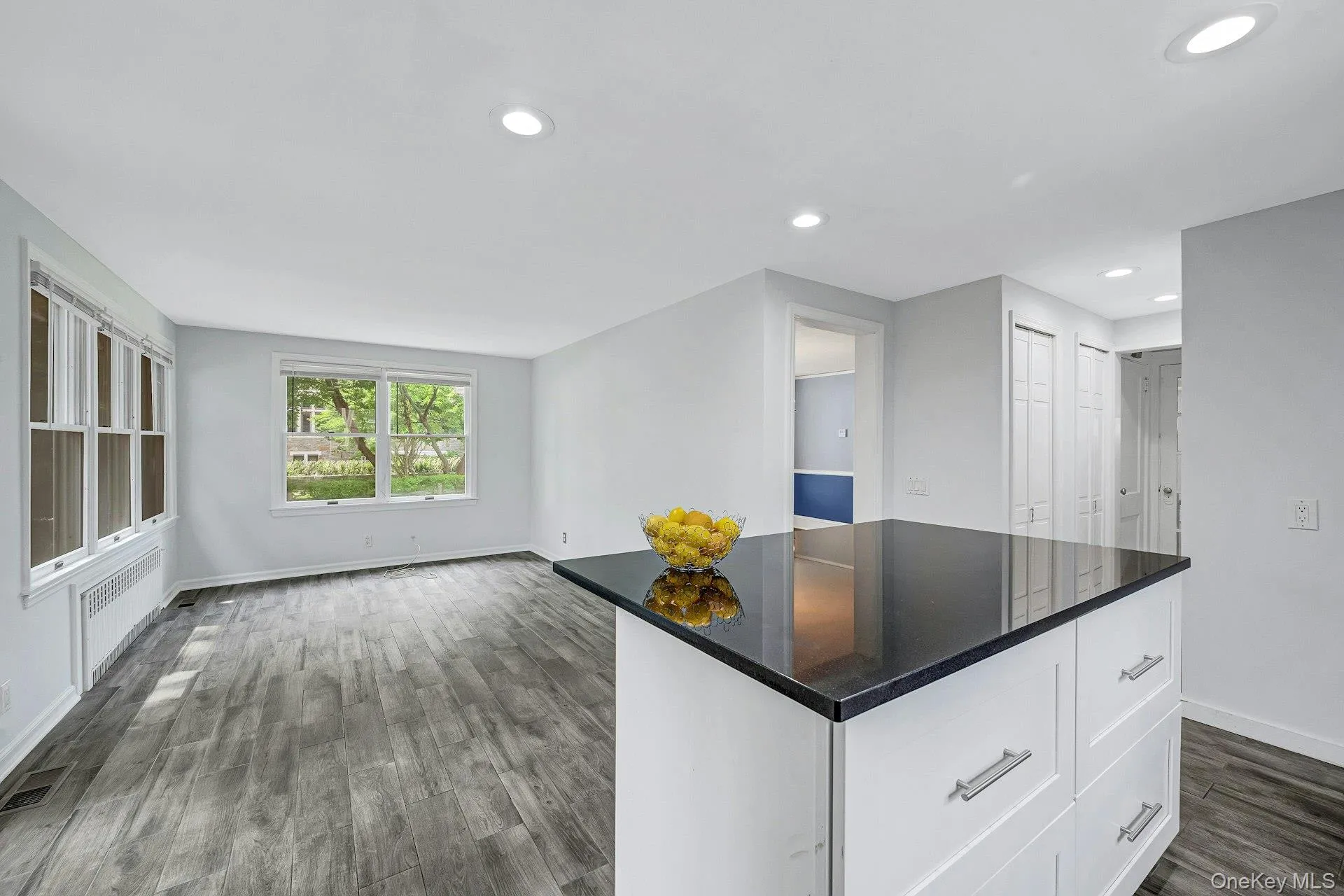 Kitchen with center island and stainless appliances and doors to yard Kitchen with center island and stainless appliances and doors to yard