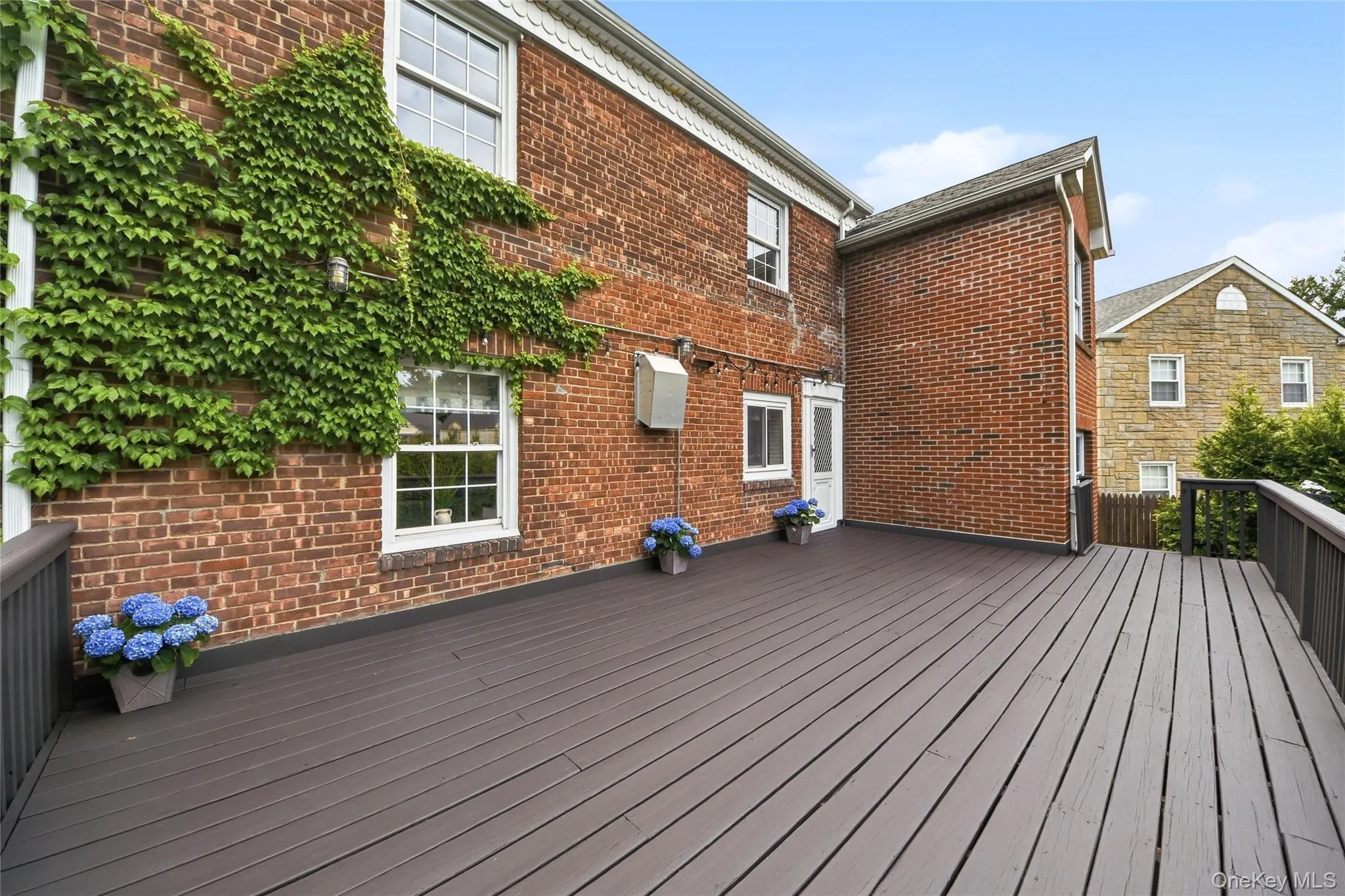 Deck with stairs leading to the garden Deck with stairs leading to the garden