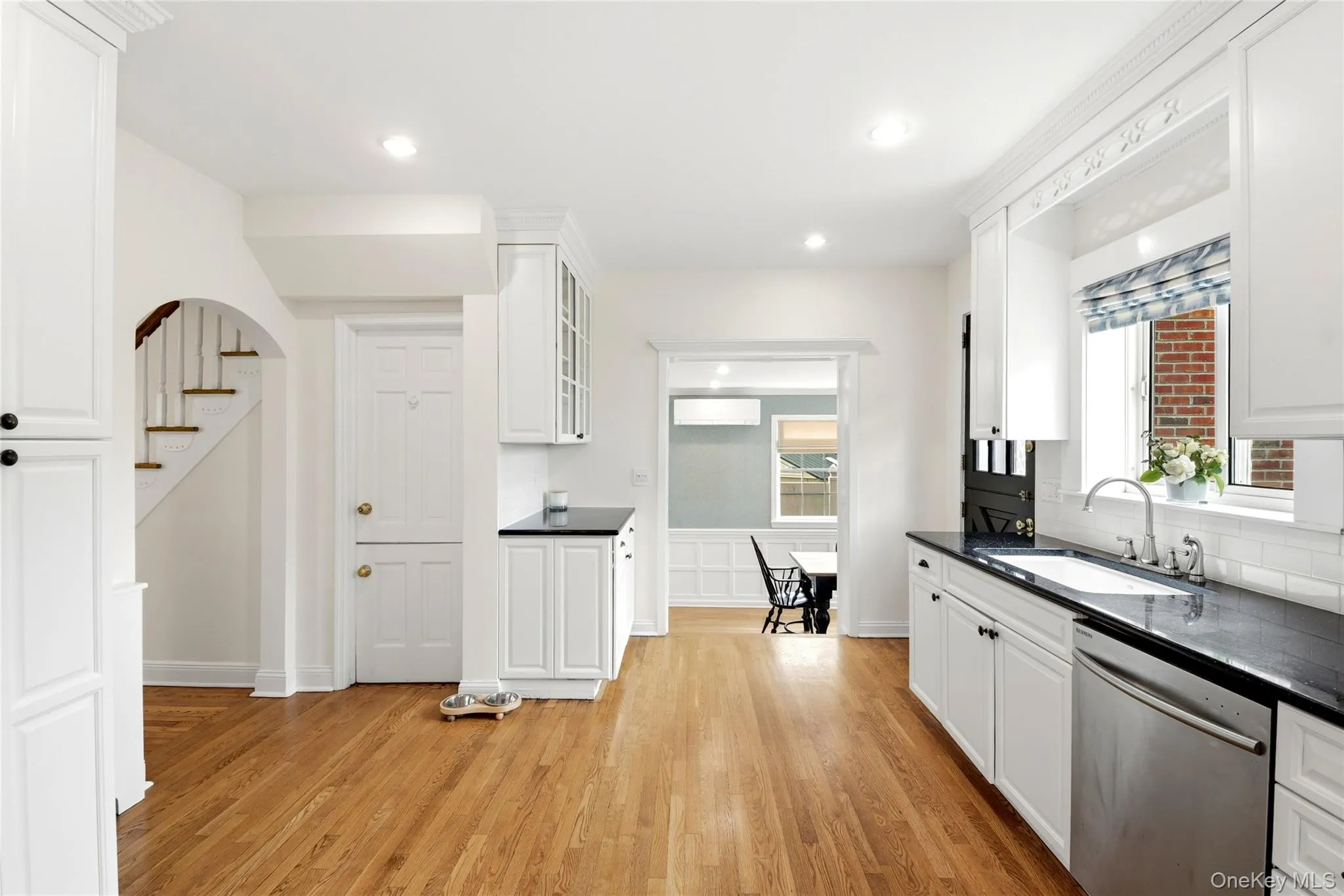 Kitchen leading to Dining room and hallway Kitchen leading to Dining room and hallway