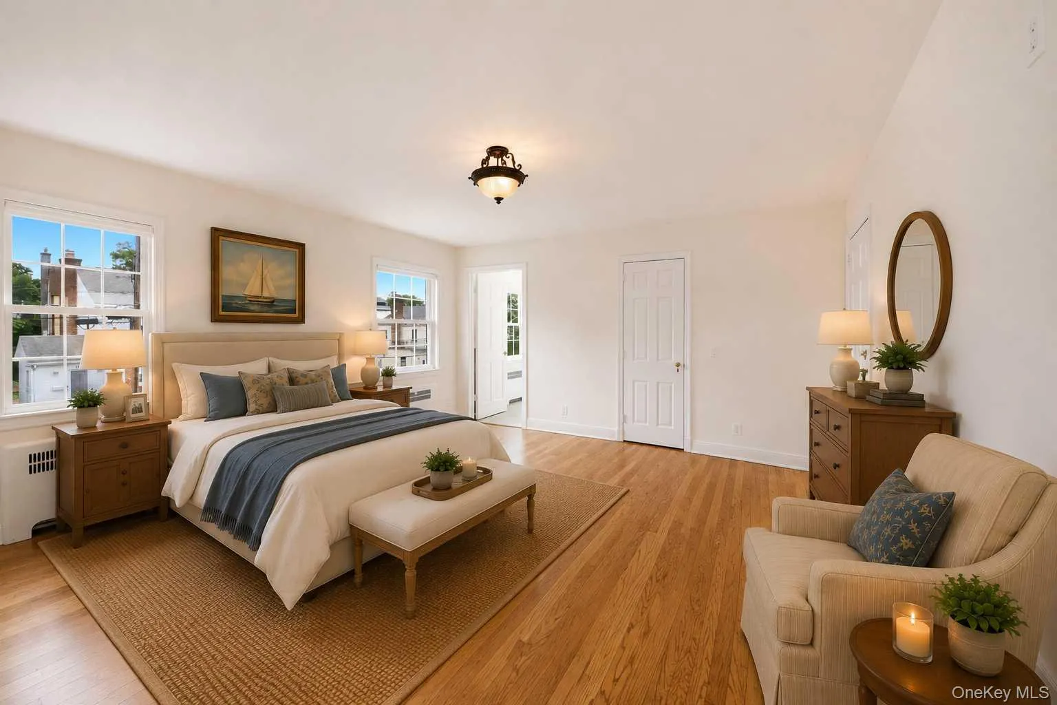 Virtually staged Primary Bedroom with door leading to en-suite and walk-in closet Virtually staged Primary Bedroom with door leading to en-suite and walk-in closet