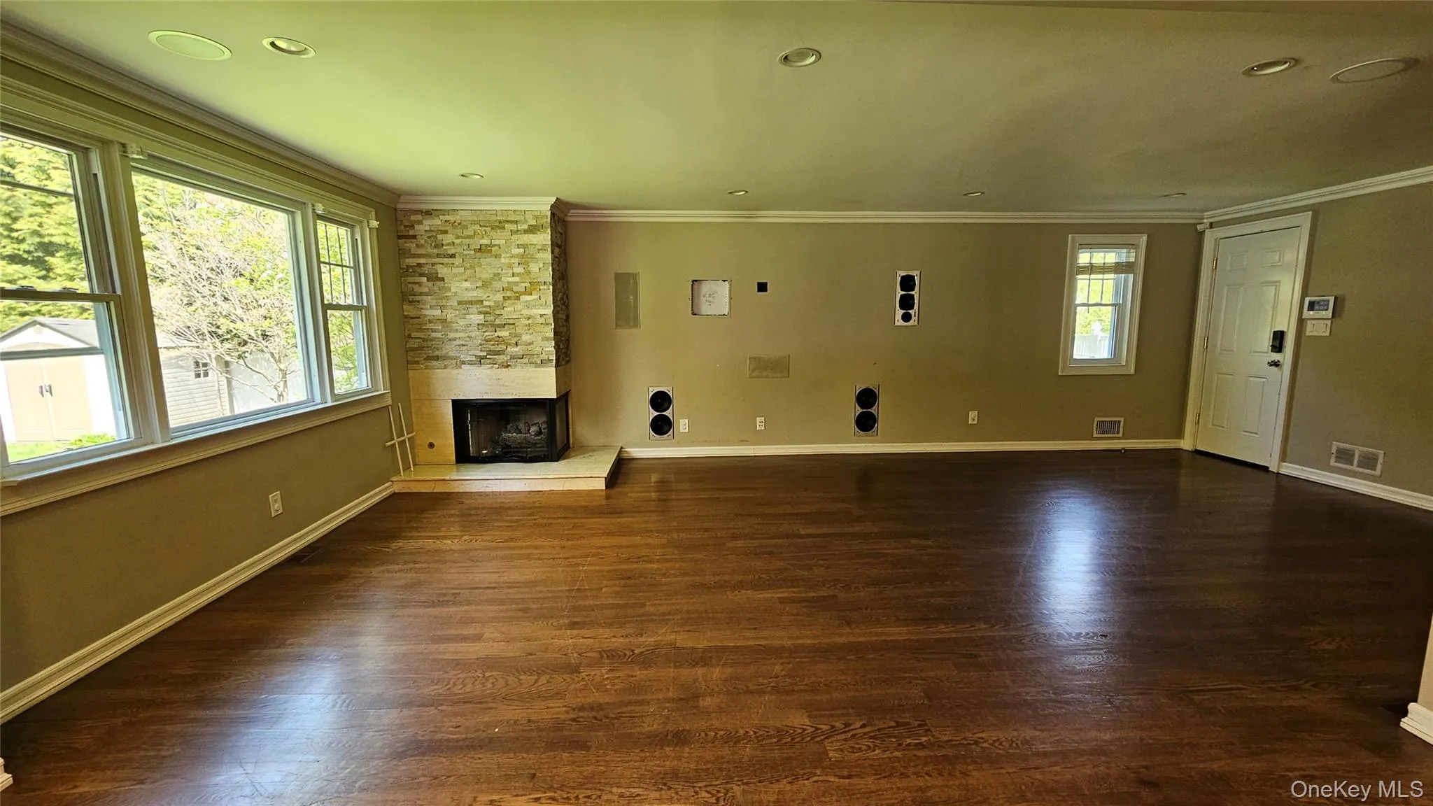 Oversized great room with gas fireplace and built in speakers Oversized great room with gas fireplace and built in speakers