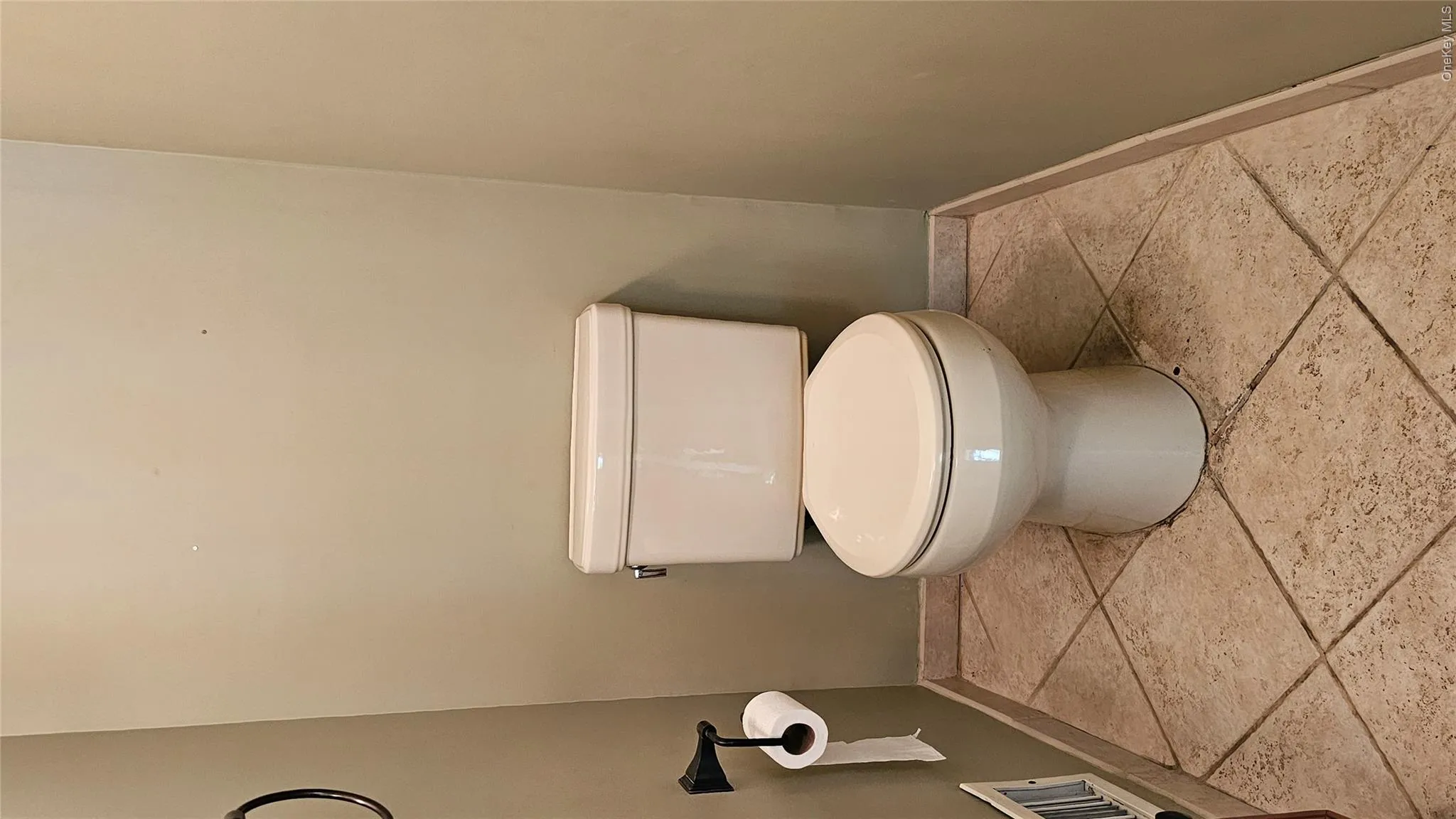 Half Bath on first floor for guests Half Bath on first floor for guests