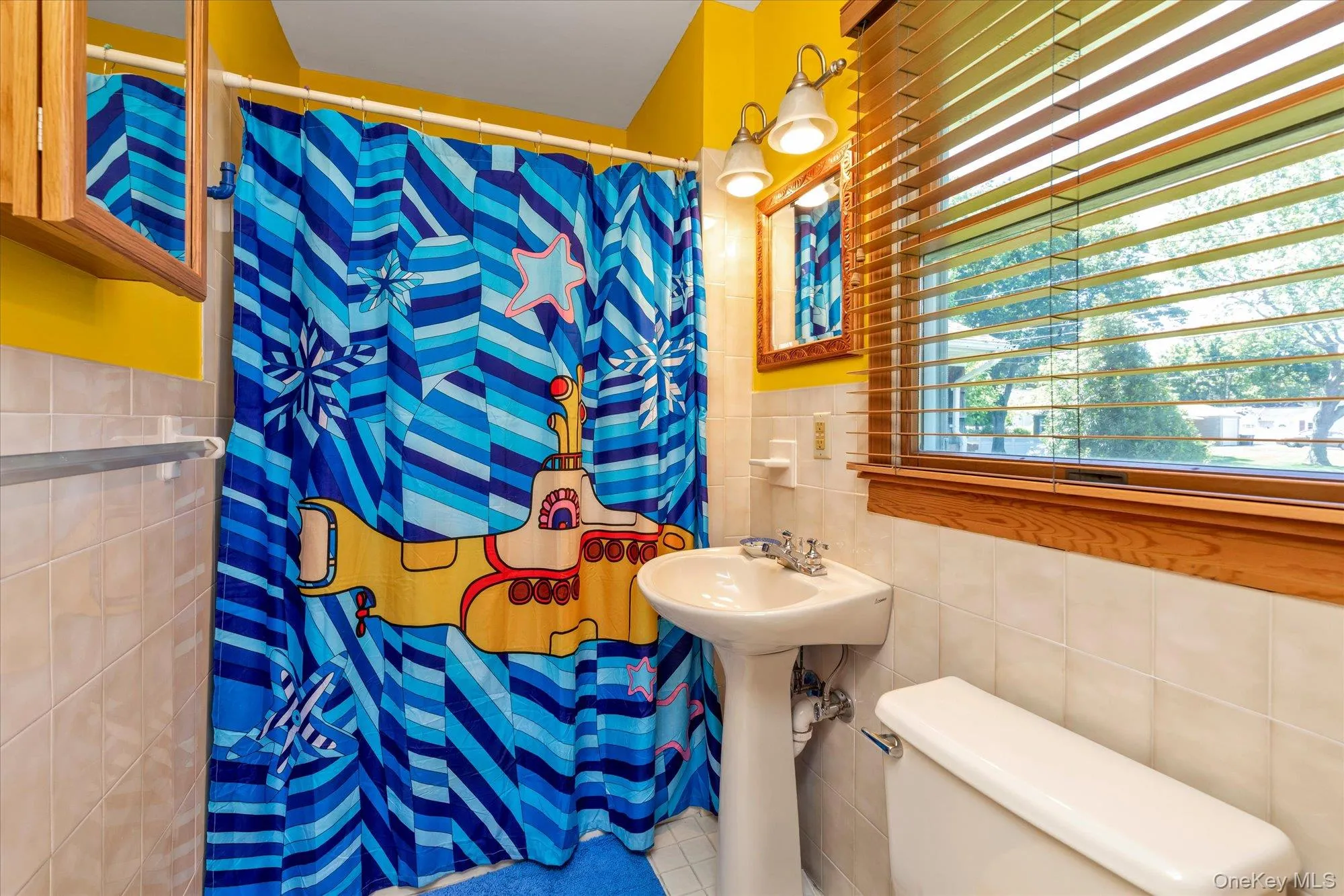 Full bath off the Family Room - great for guests Full bath off the Family Room - great for guests