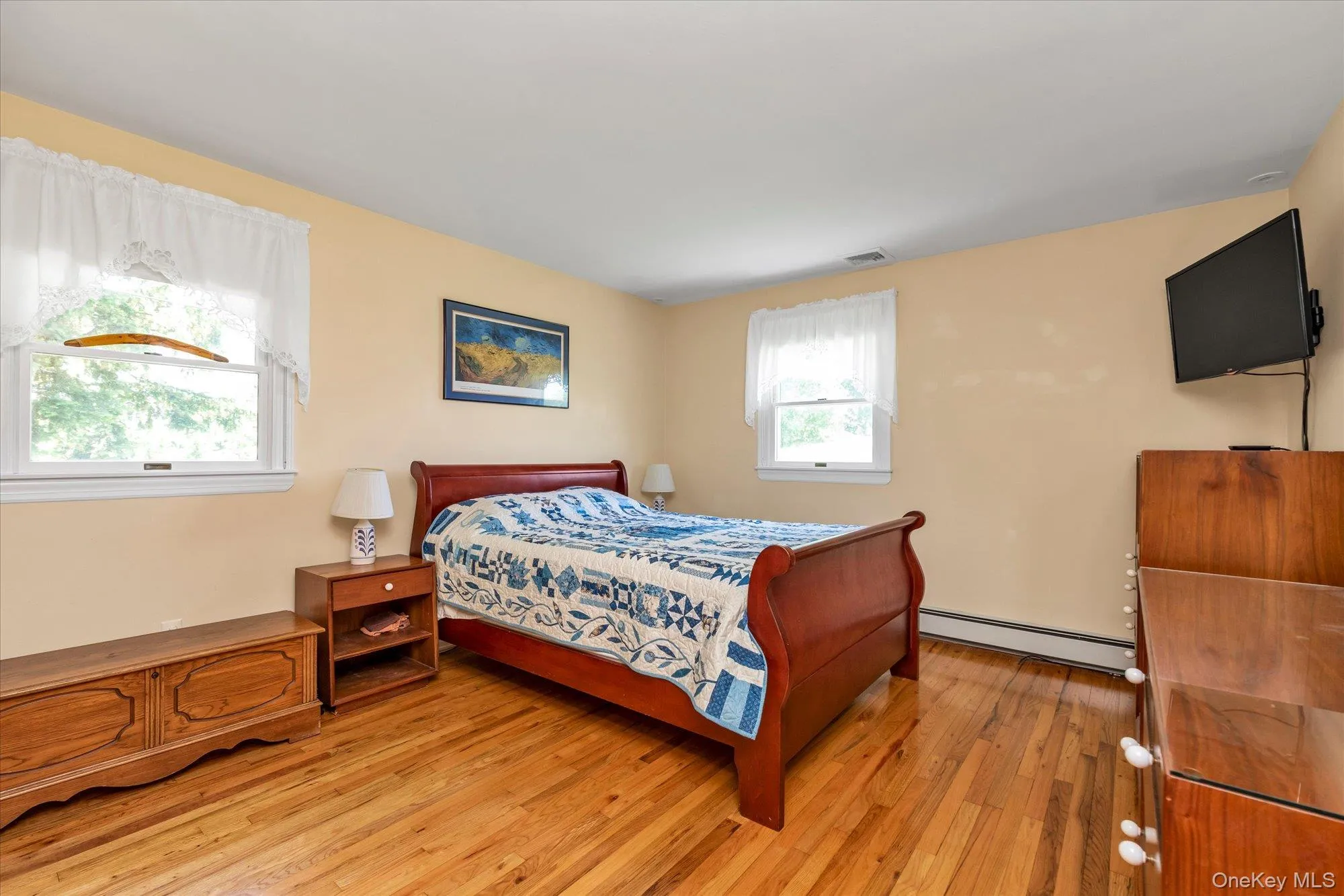 primary bedroom, hardwood floors - first floor primary bedroom, hardwood floors - first floor