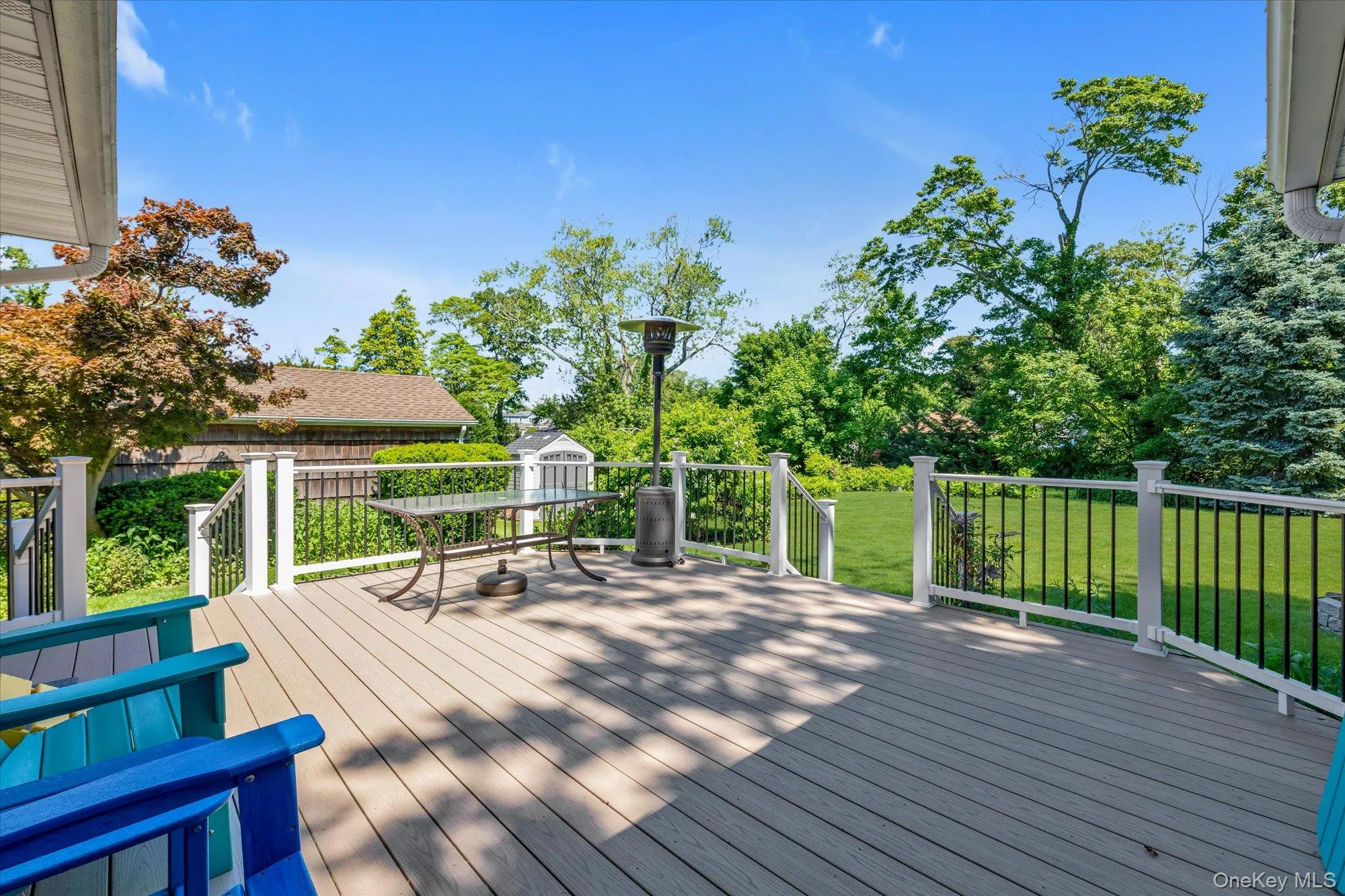 new TREX deck accessible from kitchen as well as the formal dining room new TREX deck accessible from kitchen as well as the formal dining room