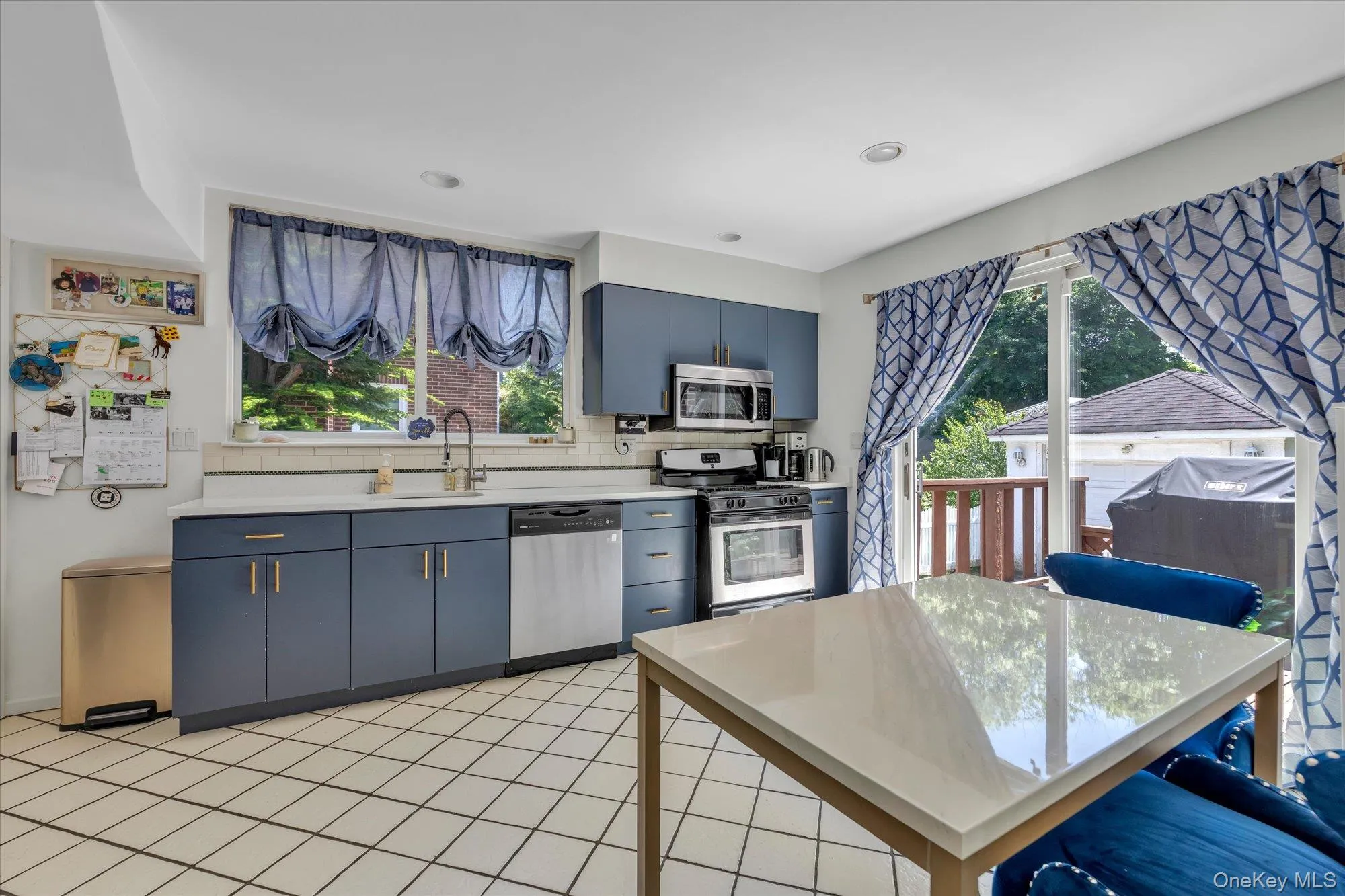 Eat in Kitchen with SS Appliances and Sliders to Deck Eat in Kitchen with SS Appliances and Sliders to Deck