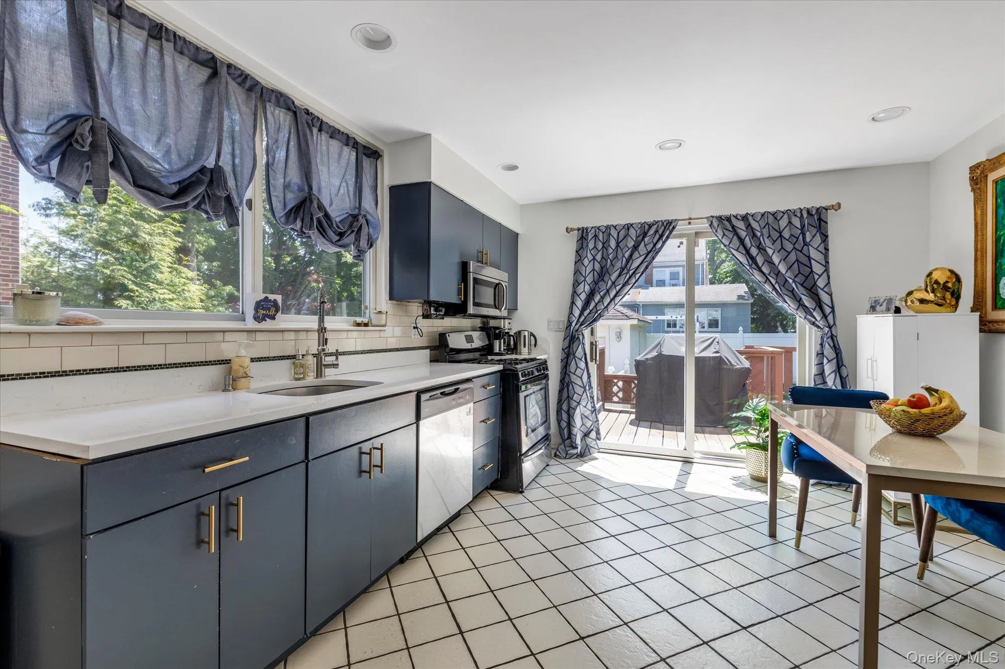 Eat in Kitchen with SS Appliances and Sliders to Deck Eat in Kitchen with SS Appliances and Sliders to Deck