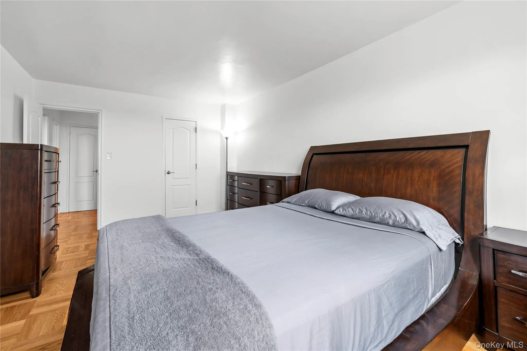 Spacious primary bedroom with wide walk-in closet. Spacious primary bedroom with wide walk-in closet.