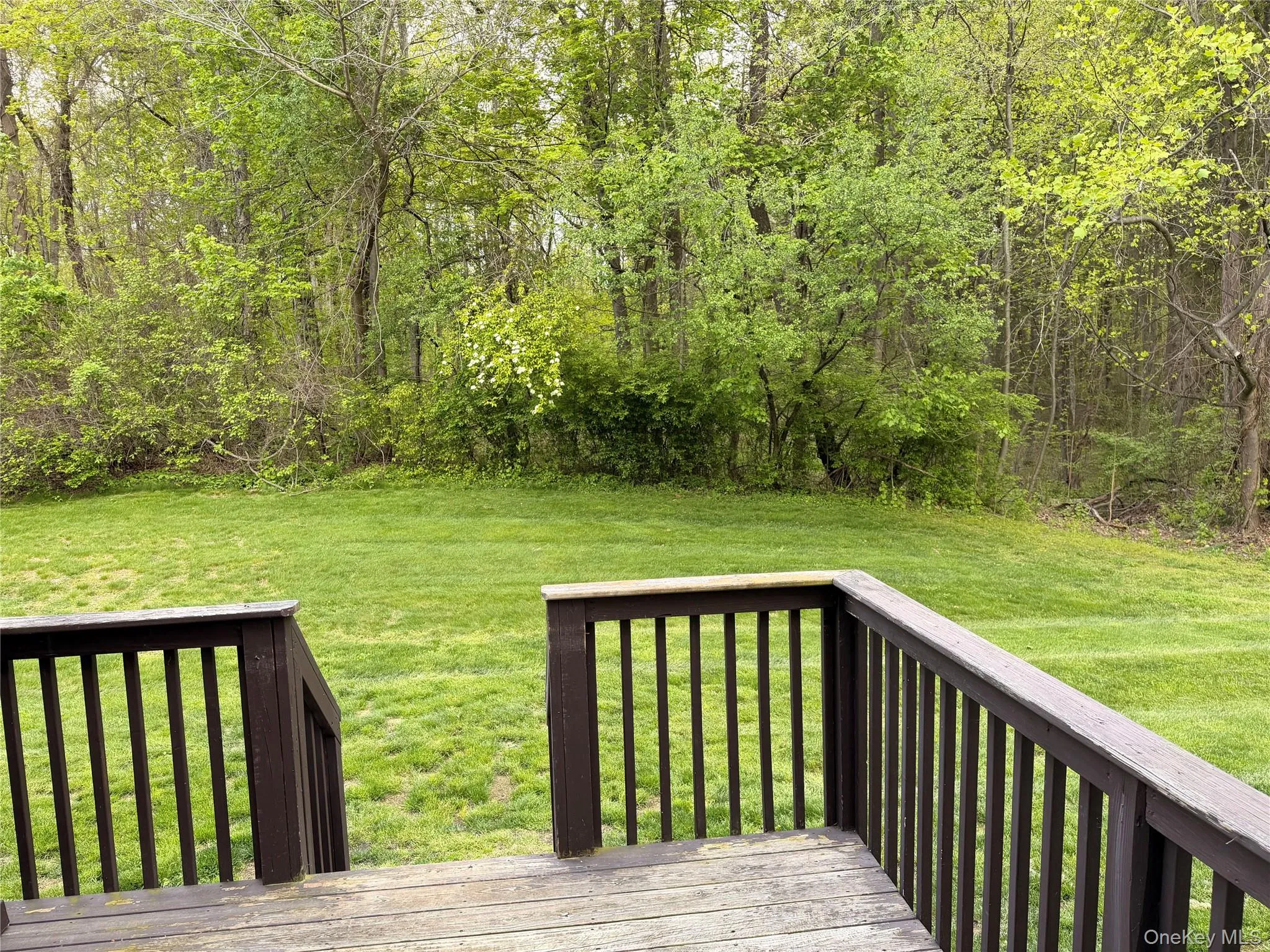 Deck on back to yard Deck on back to yard
