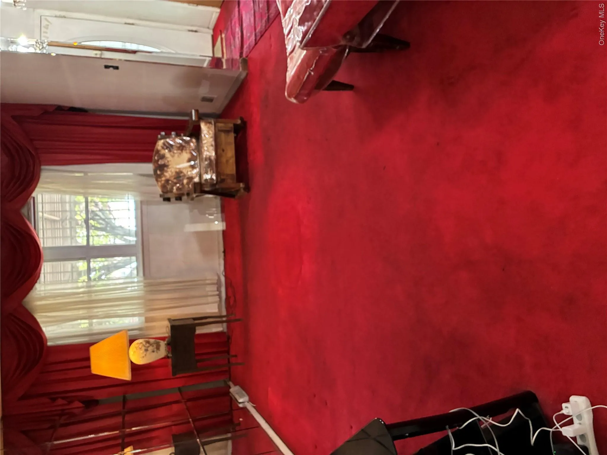 Large living room with double windows Large living room with double windows